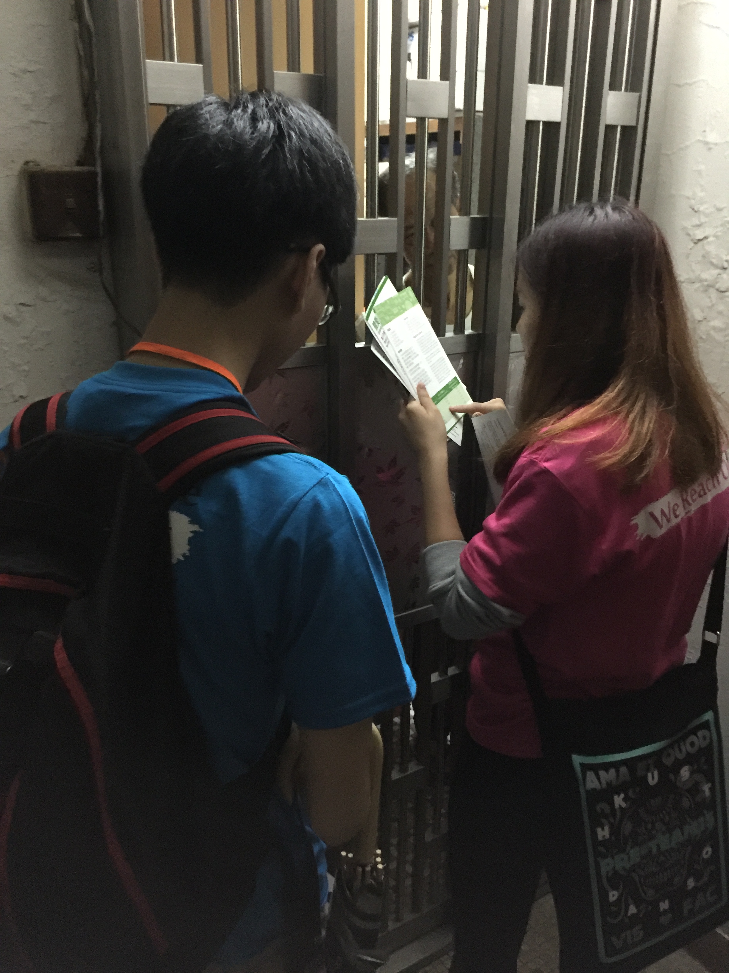 Volunteers visiting residents and introducing the government funding