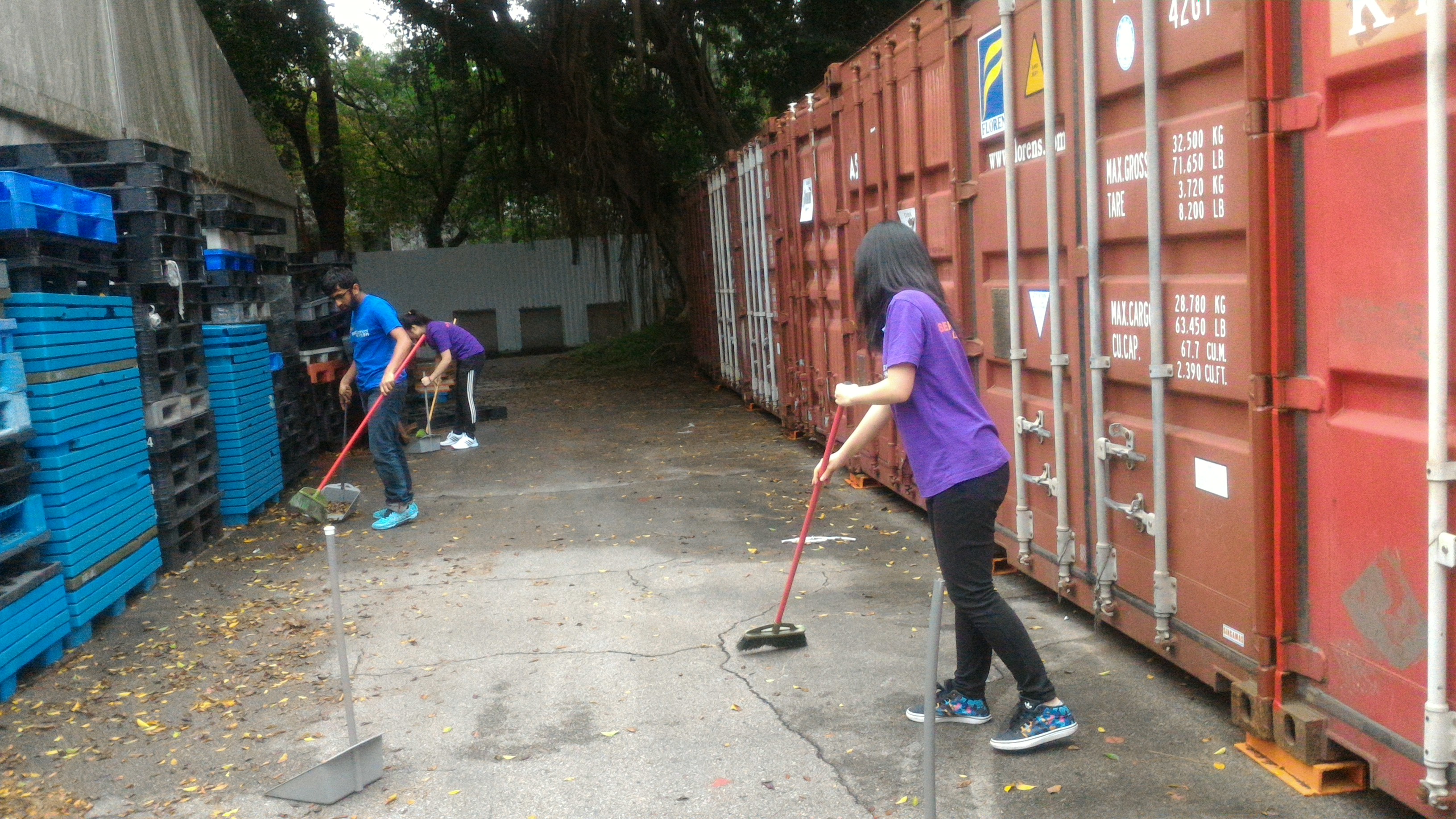 Volunteers helping in cleaning the Crossroads base