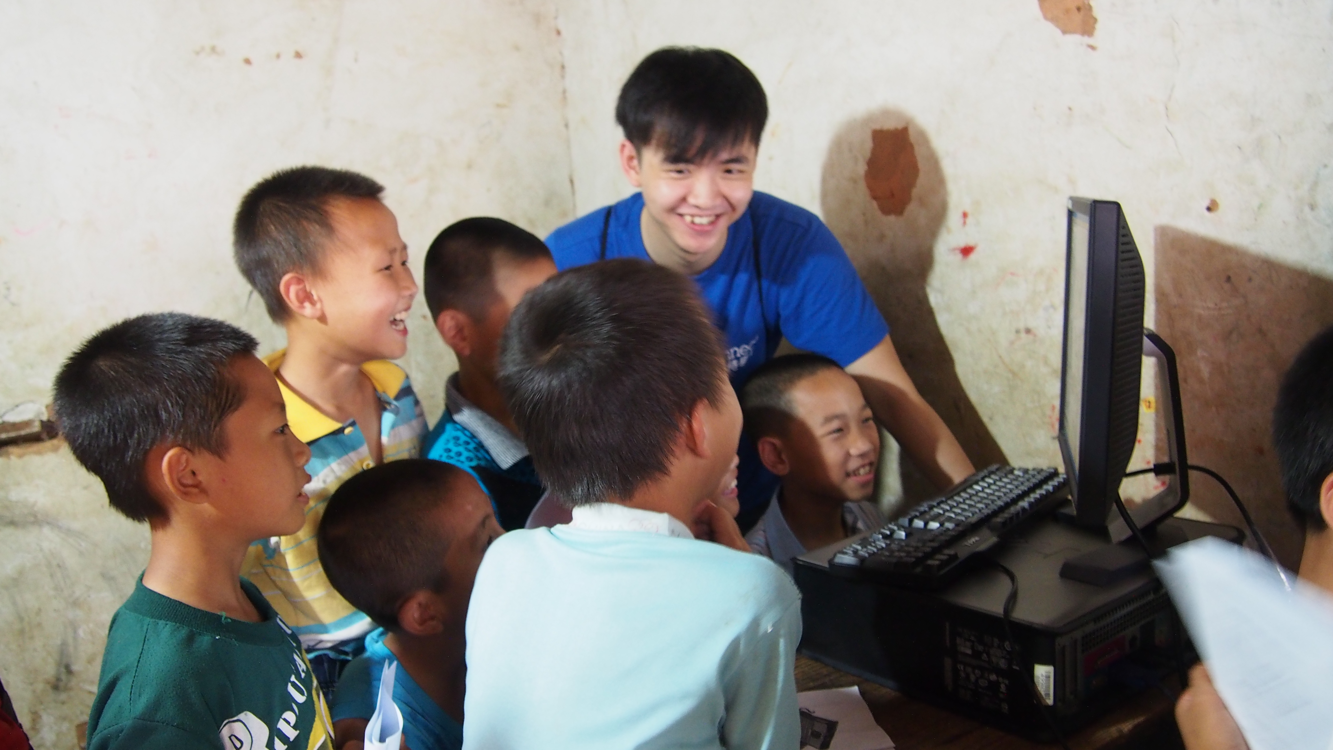 Children having fun in learning computer!