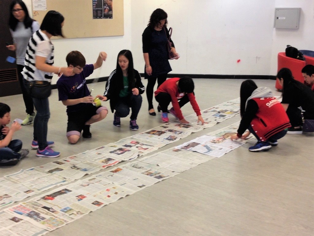 Volunteers playing games with Mentally challenged children and their families in groups