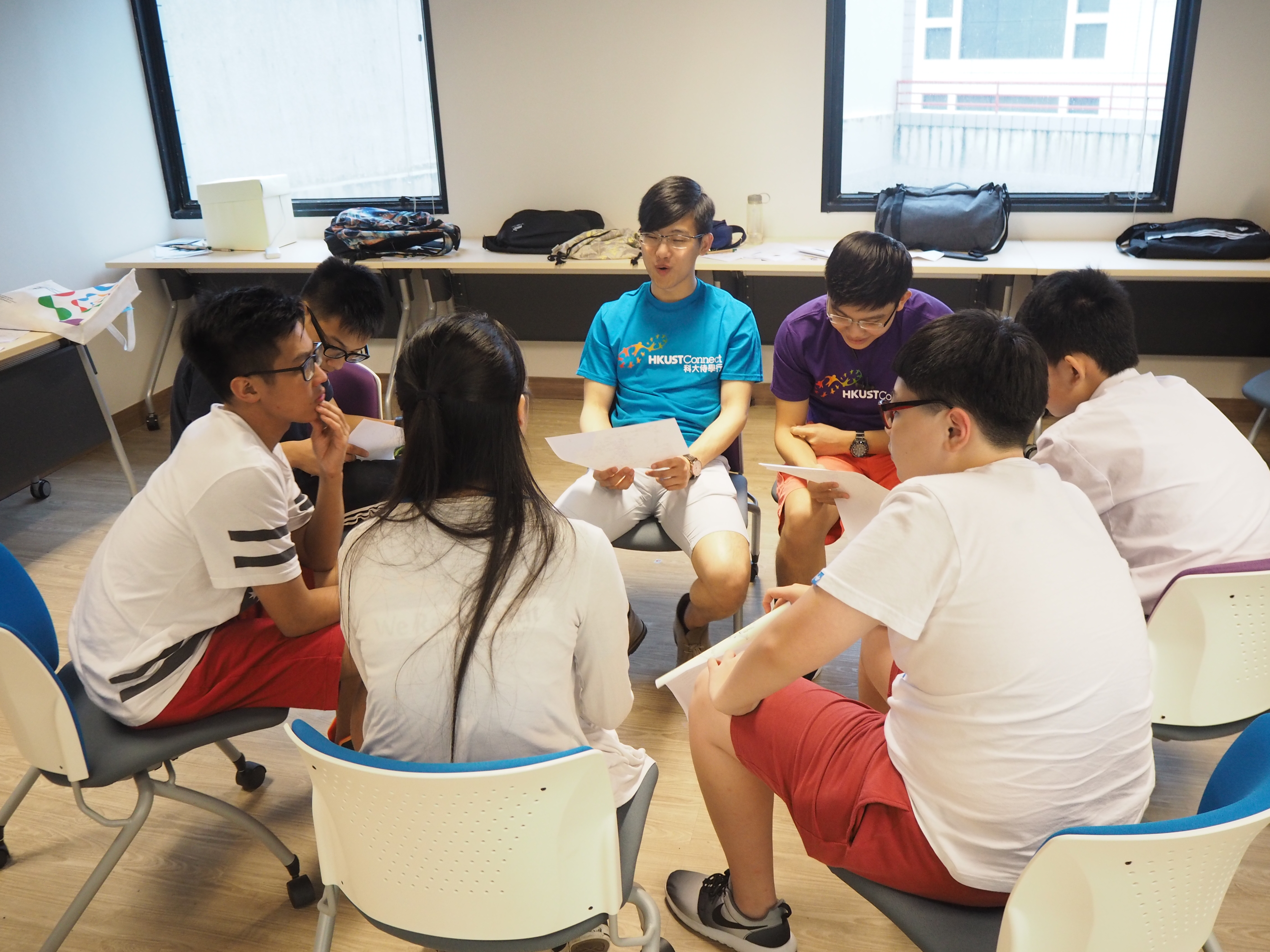 Volunteers guiding the participants to prepare for the tour