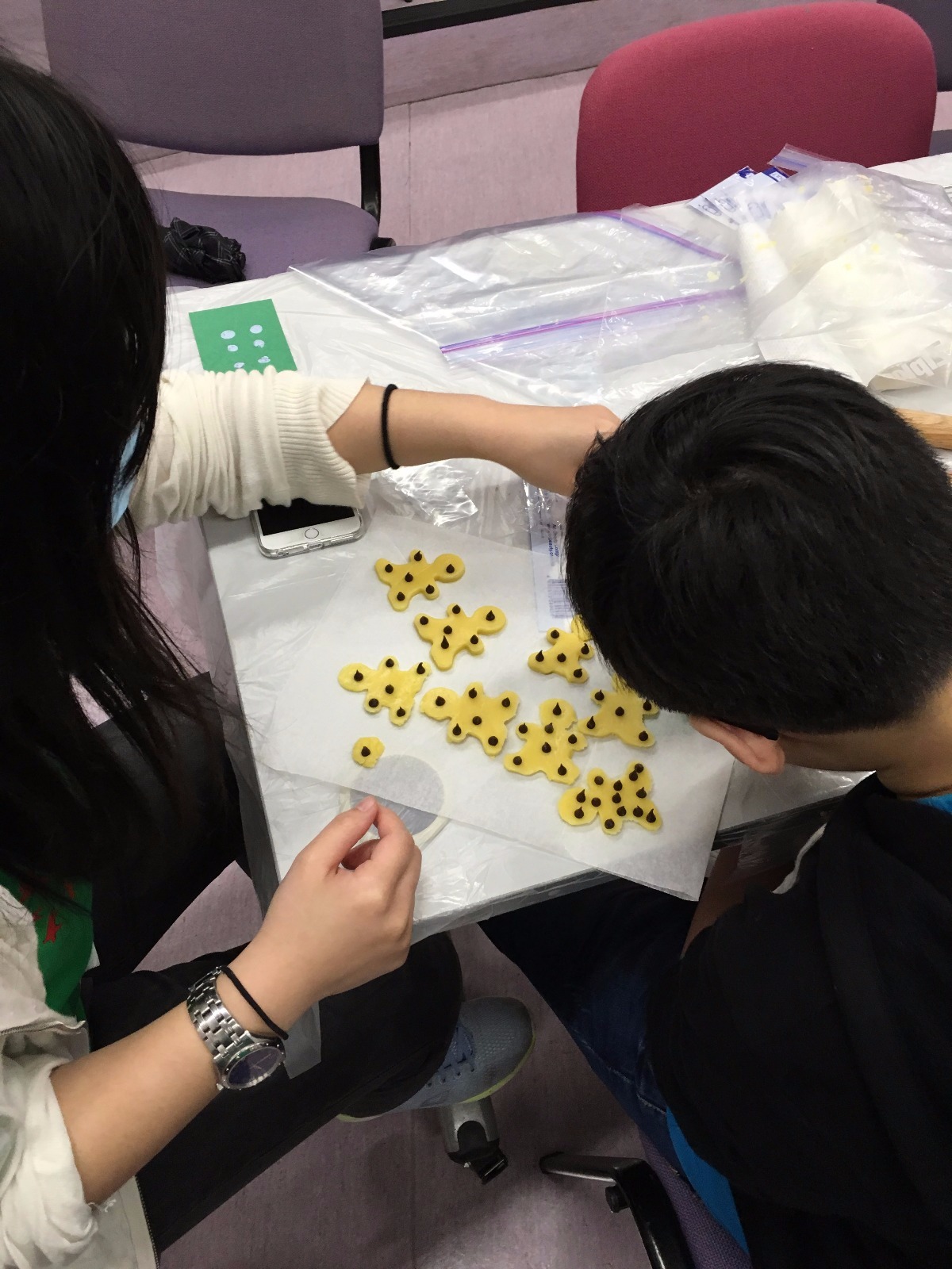 Making cookies with visually impaired children