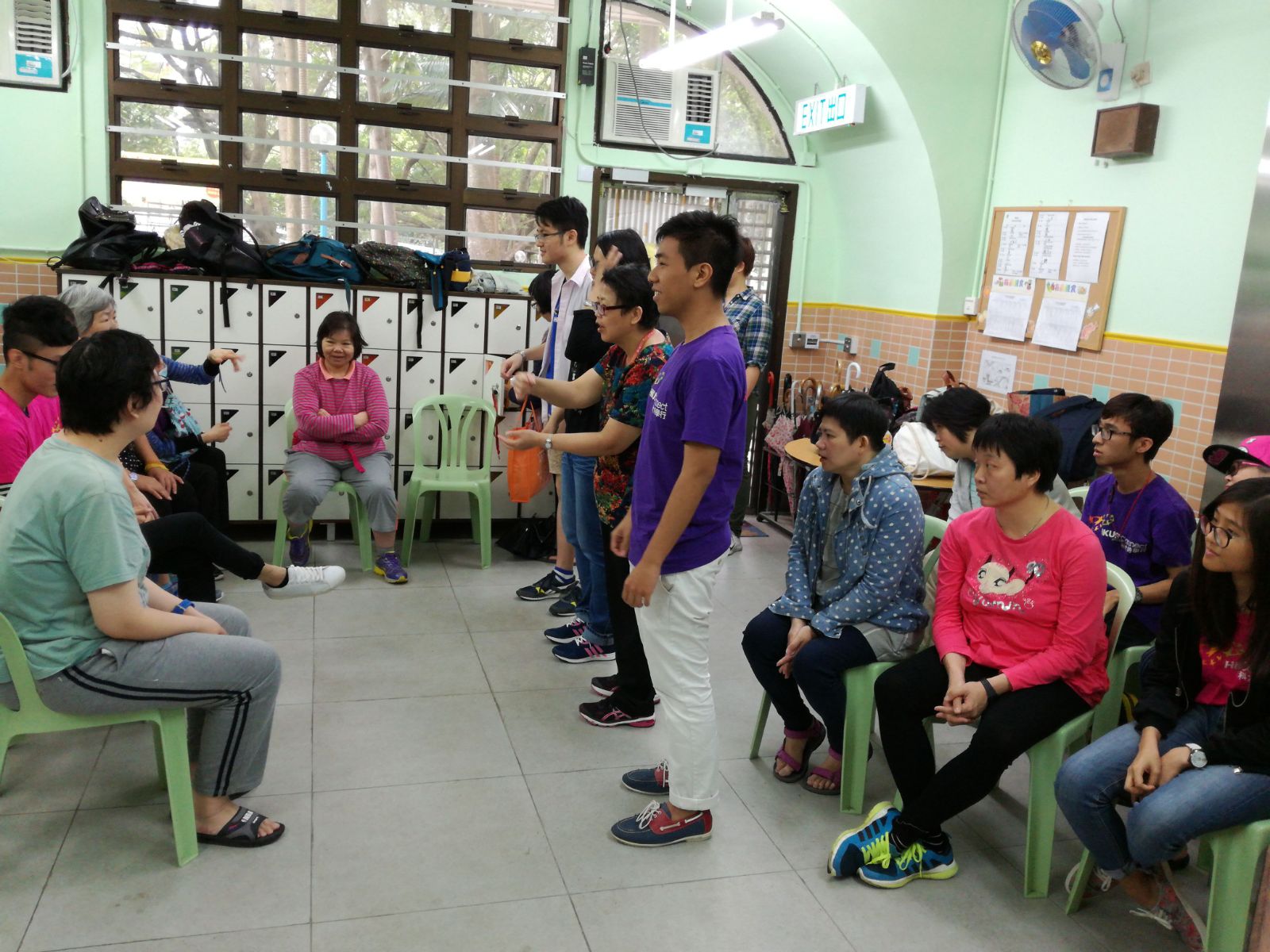 Volunteers playing interactive games with the service recipients