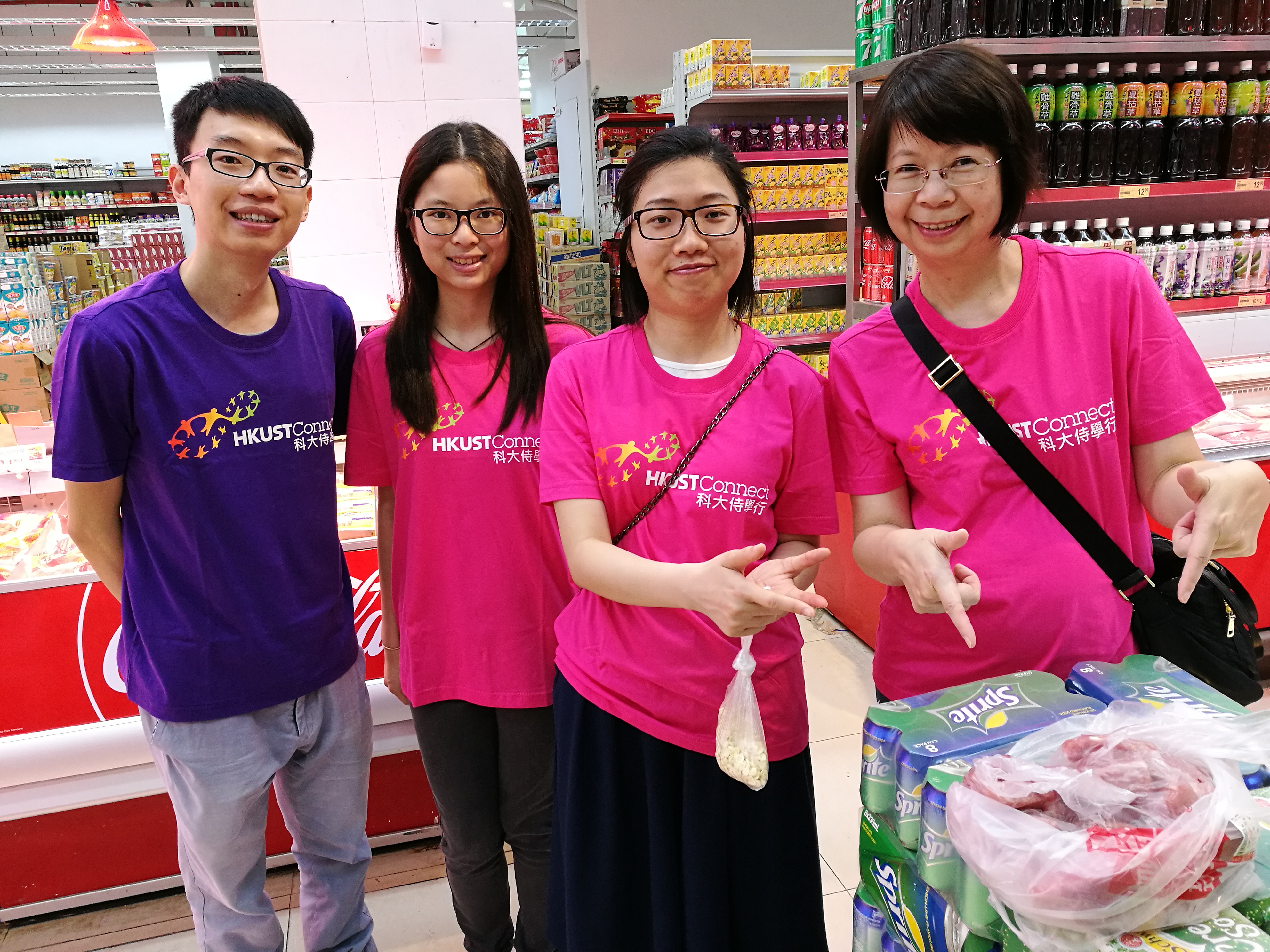 Volunteers buying ingredients together from the supermarket