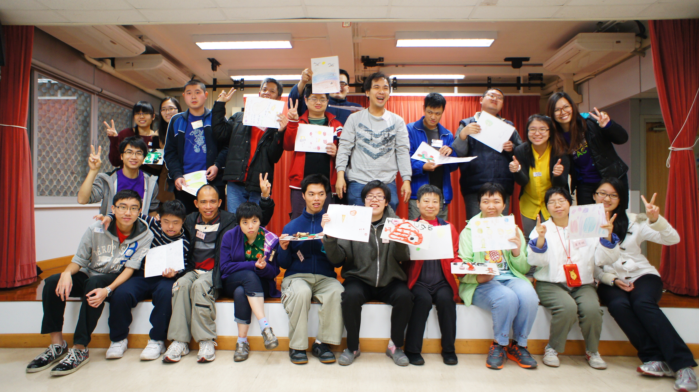 A group of photo of volunteers and the service recipients with their beautiful art work