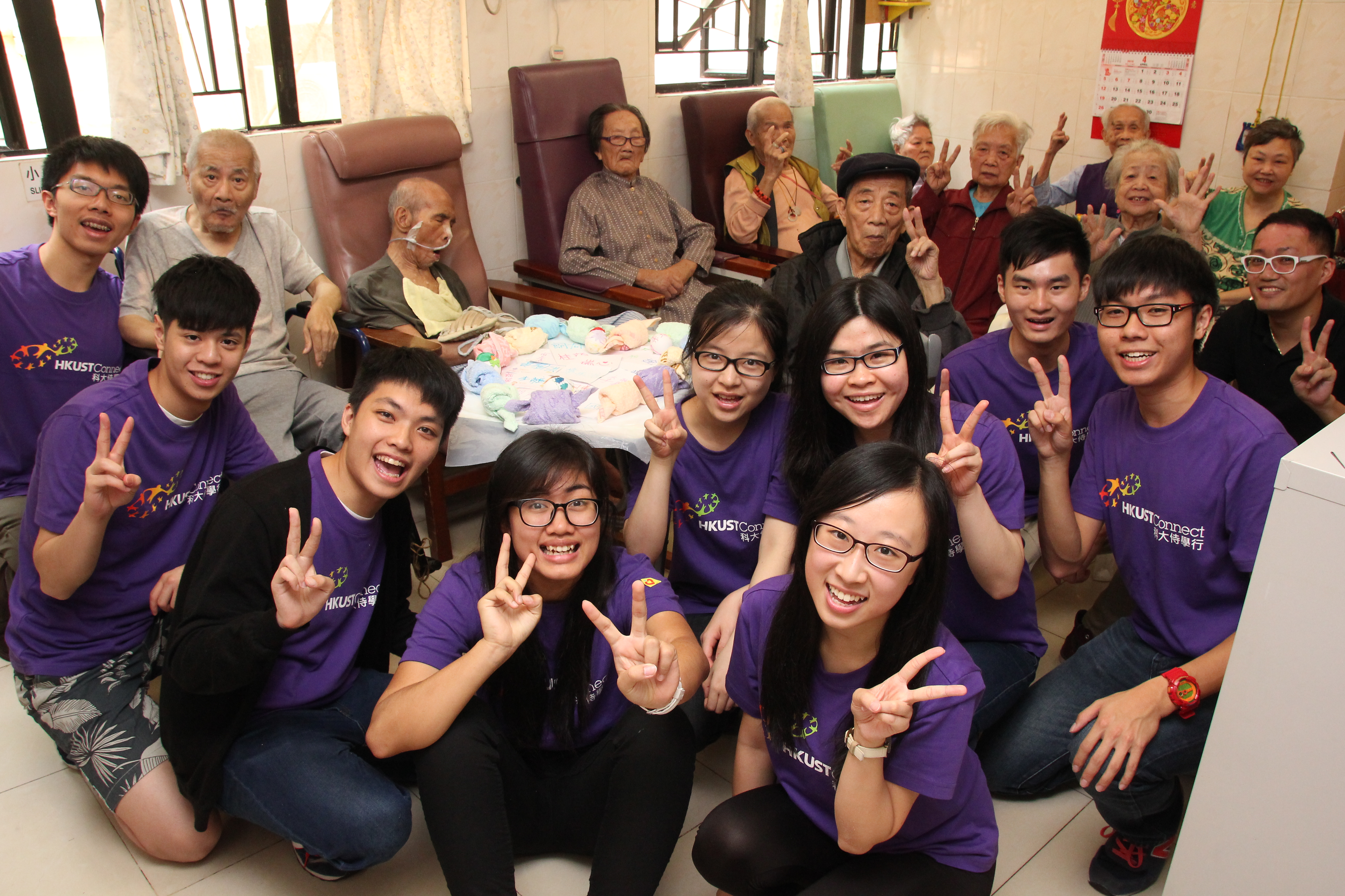 A group of photo of the volunteers and the elders