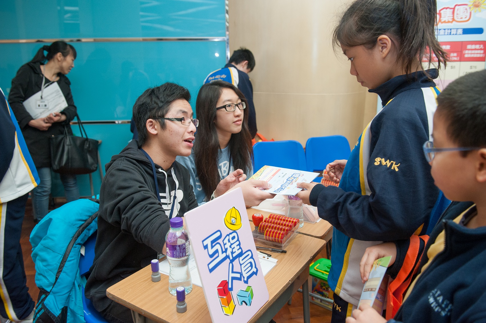 Volunteers conducting job interviews with students