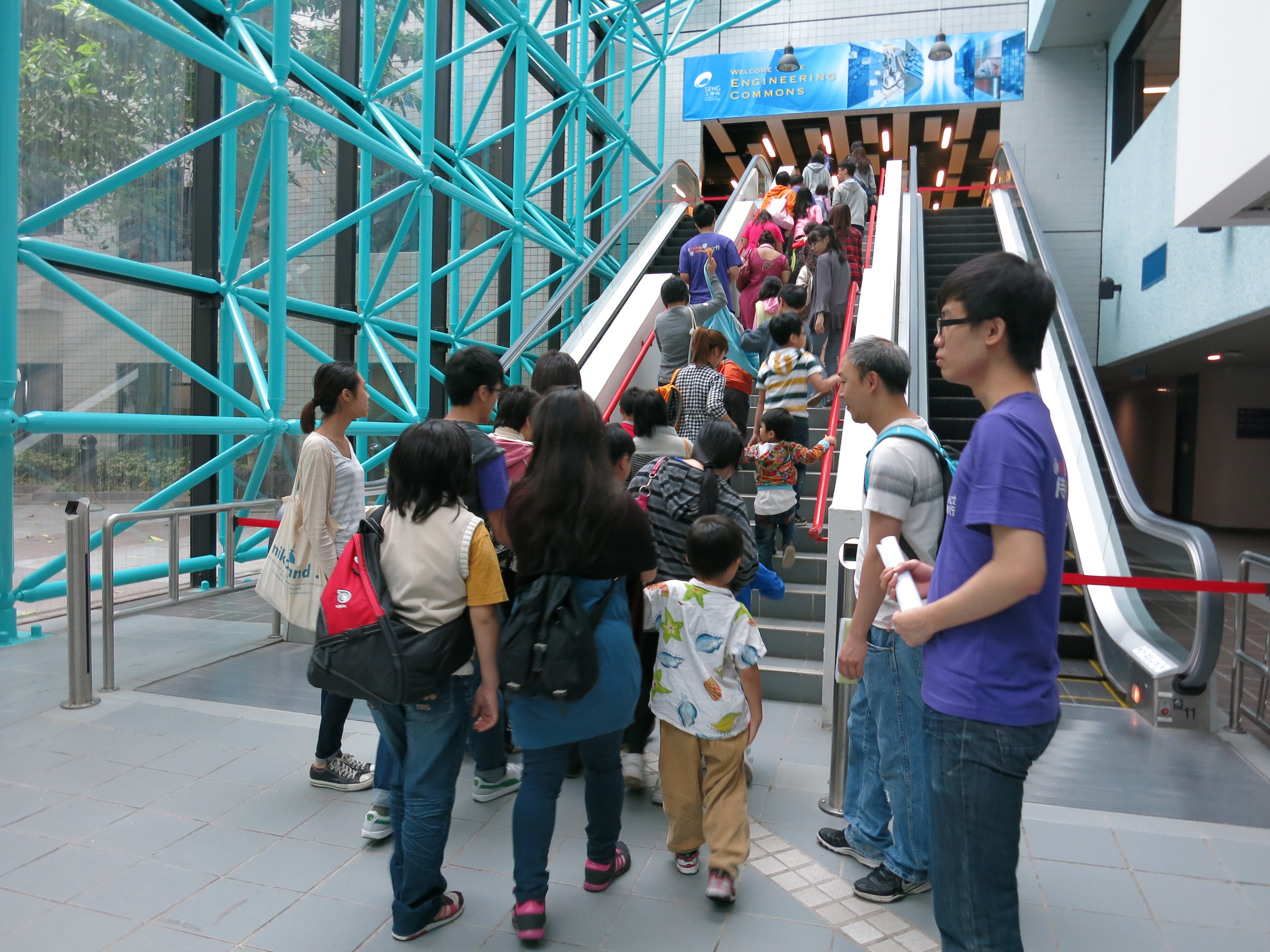 Volunteers guiding participants on a campus tour to get a taste of university life