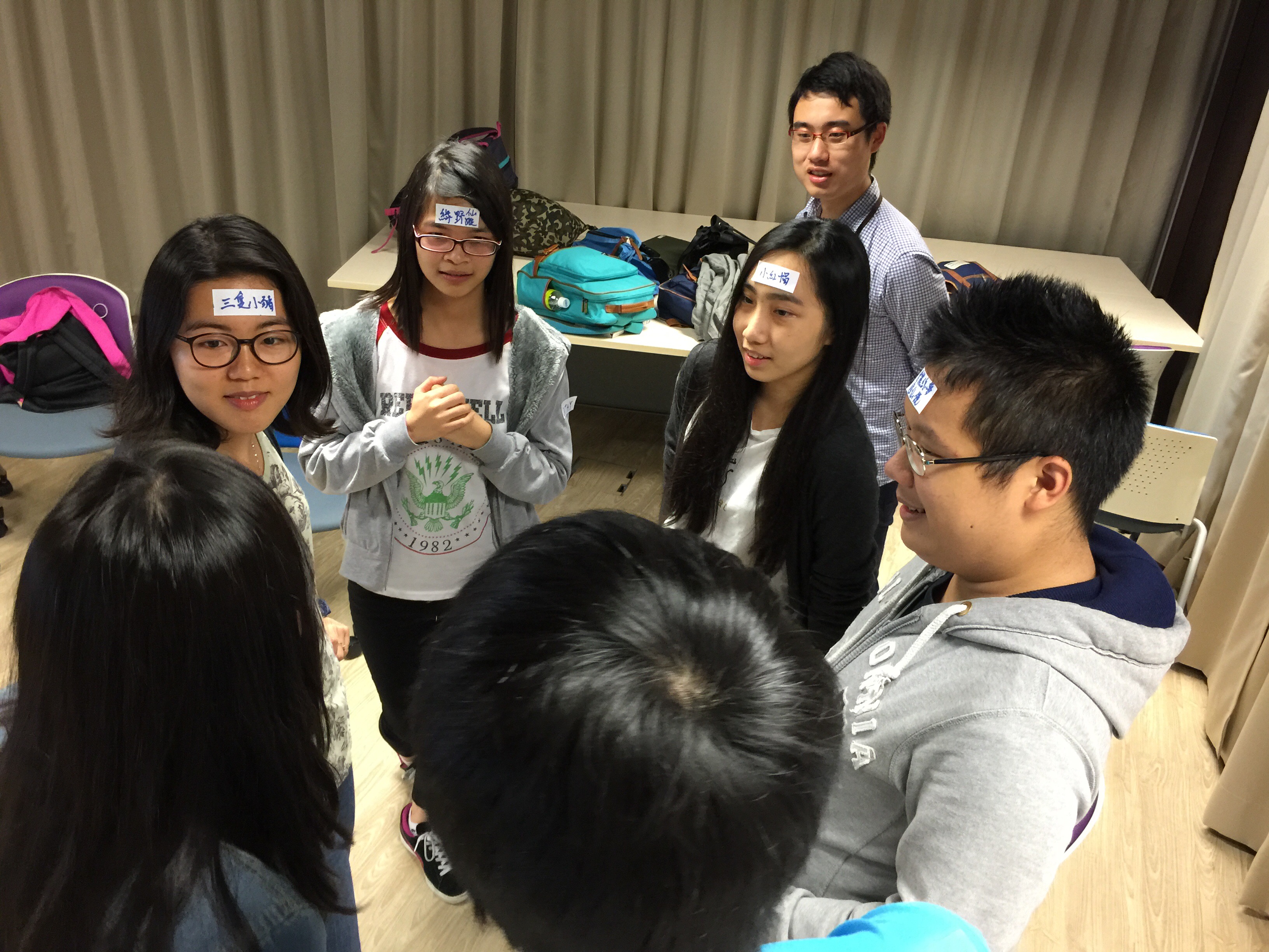 Volunteers playing ice breaking game before service
