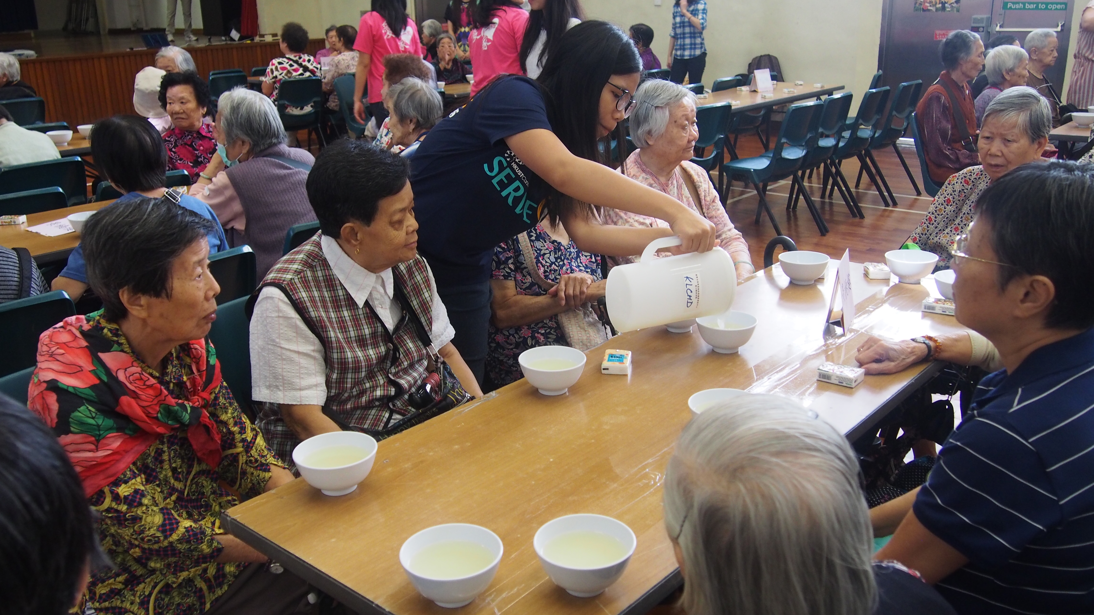 Student volunteers serving the soup