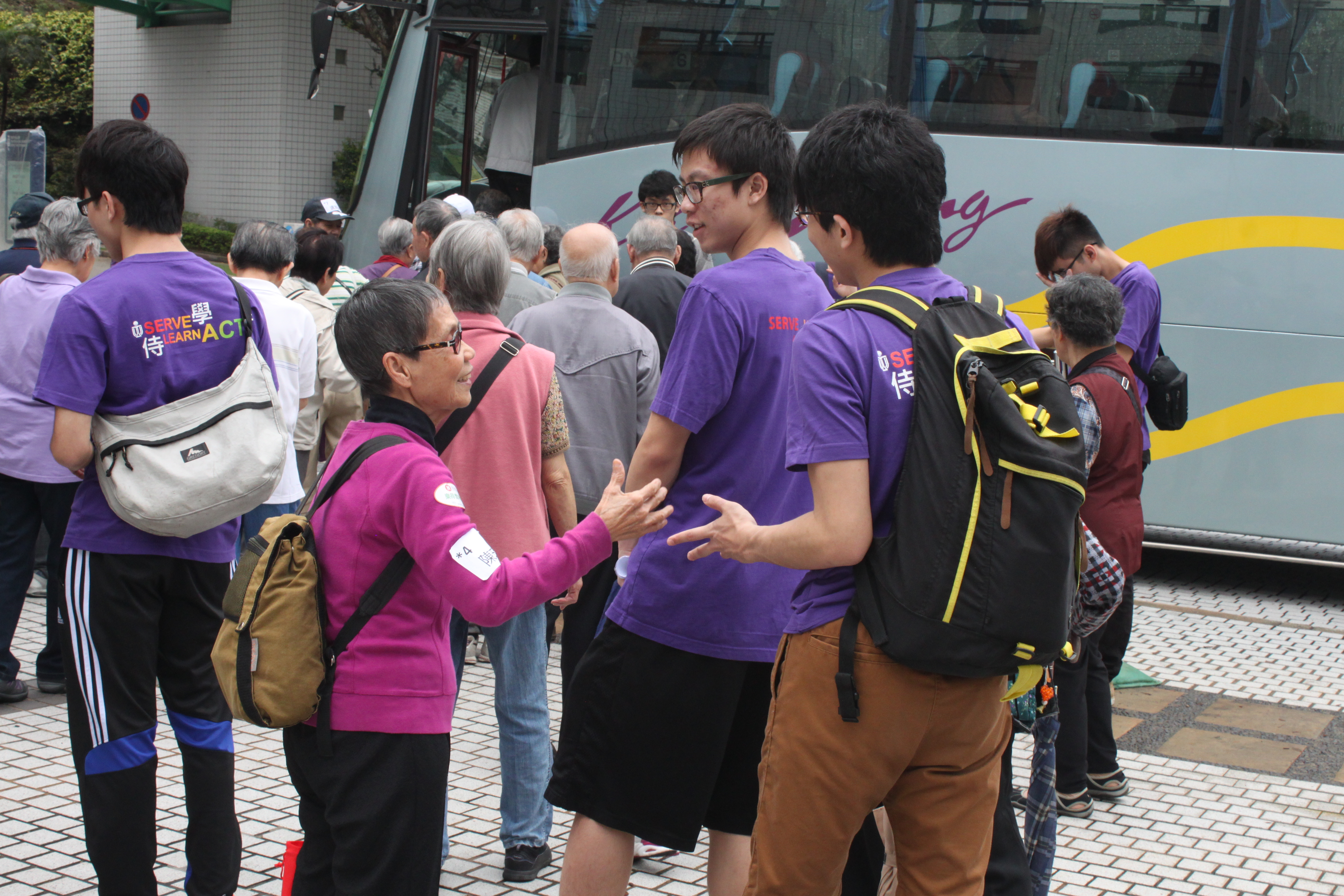 Volunteers saying goodbye to the elders