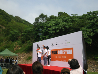 The event host announcing the start of the event