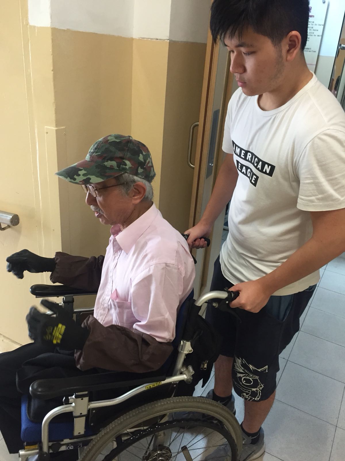 Volunteer interacting with the wheelchair user