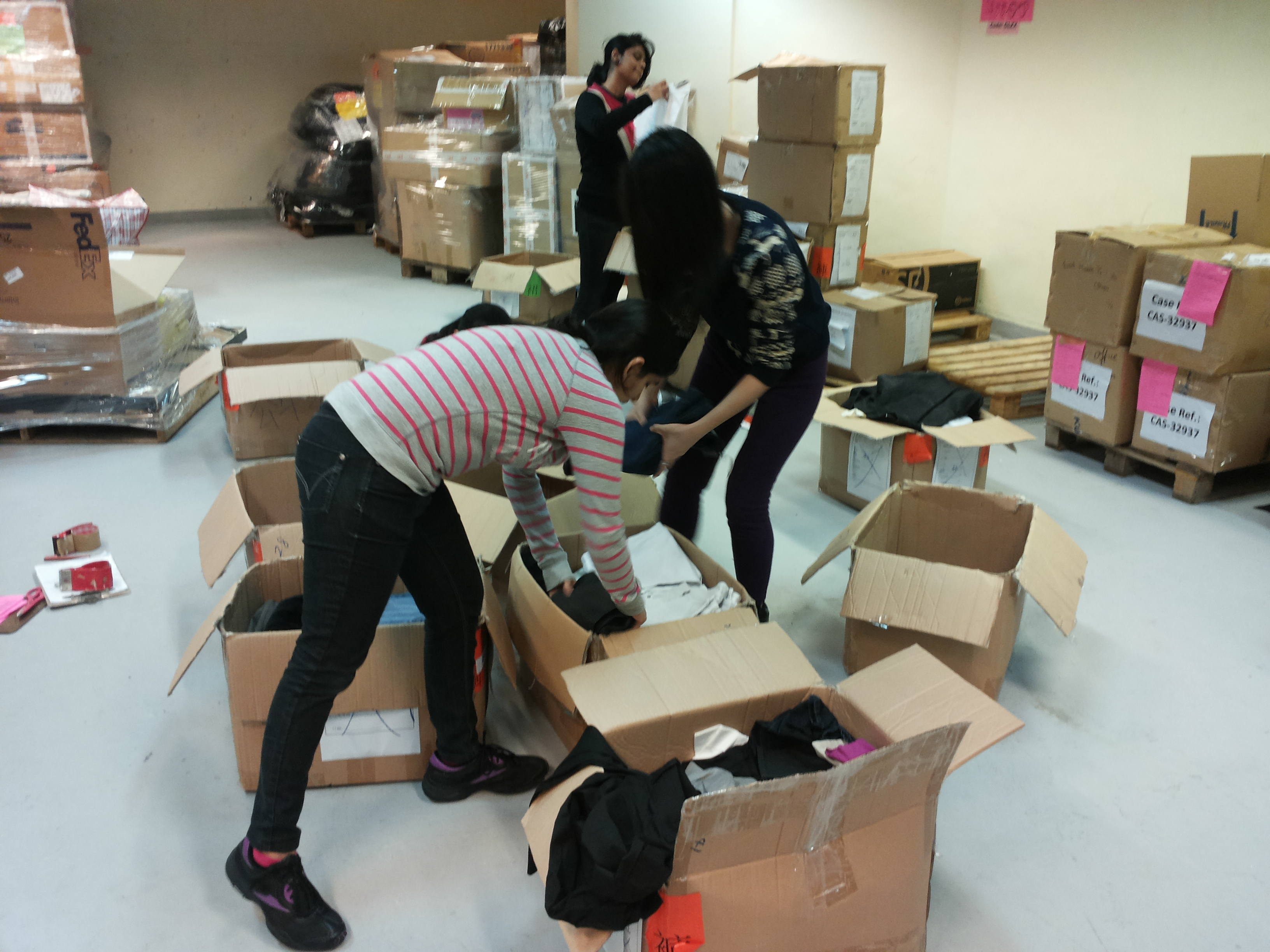 Volunteers are diligent in packing