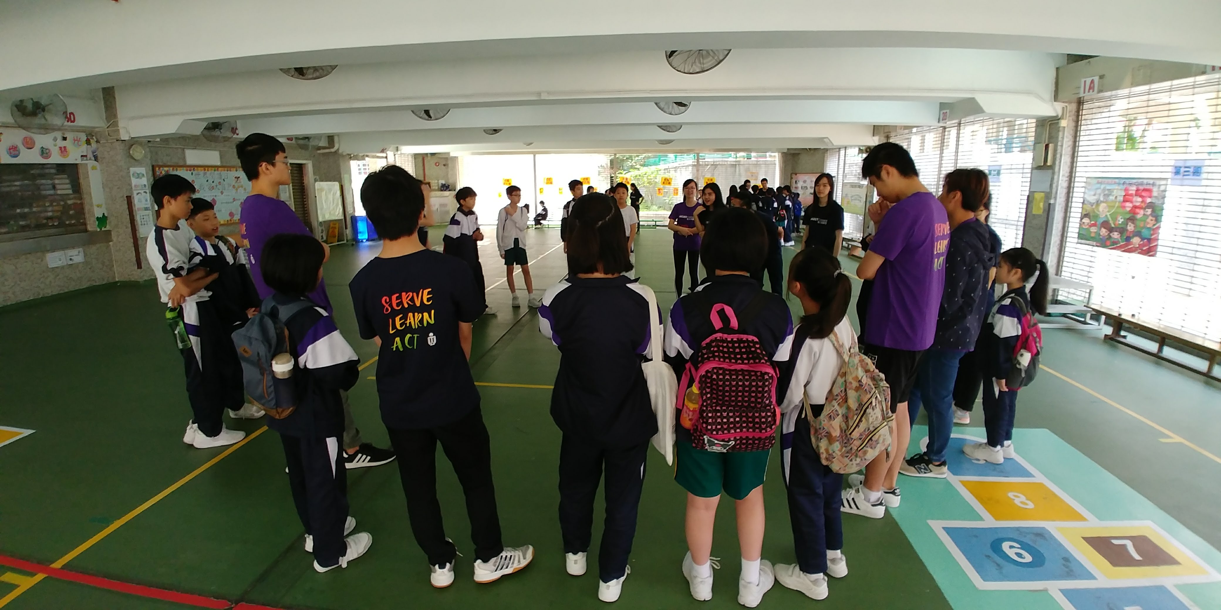 Playing an interactive game with students.