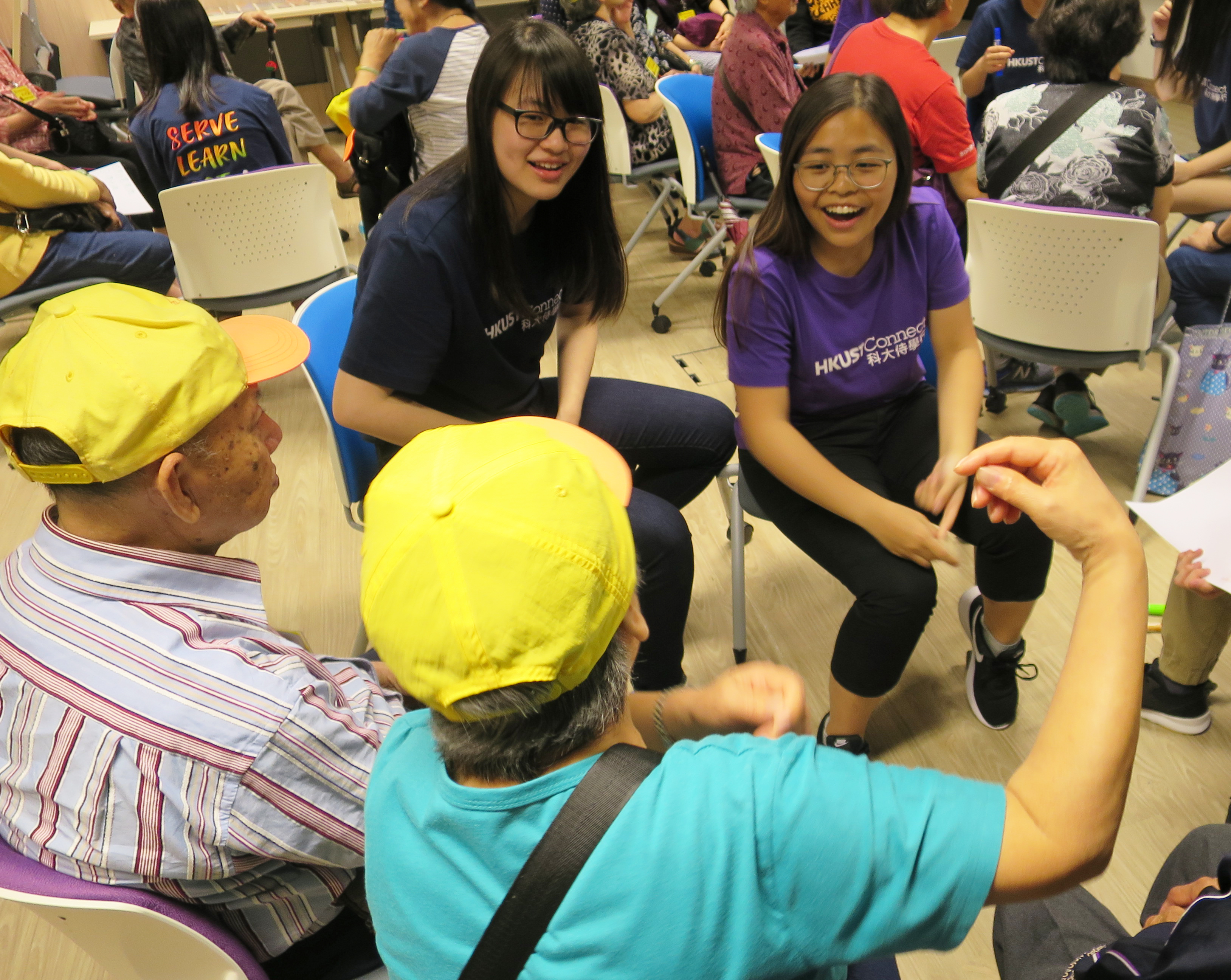 Volunteers and elderly discussing their views of life and death