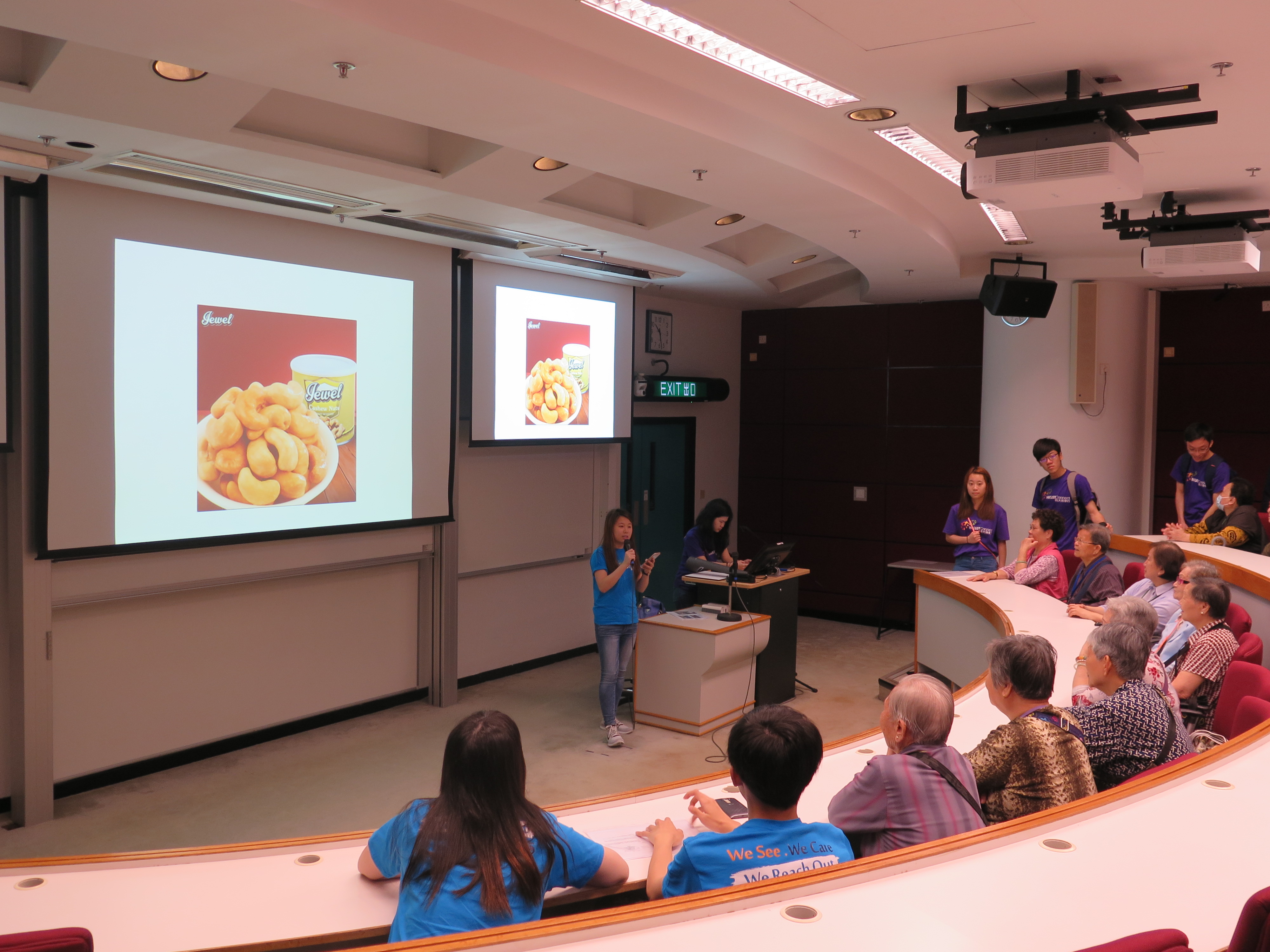 Elderly Singletons learning about healthy food in the lecture threatre