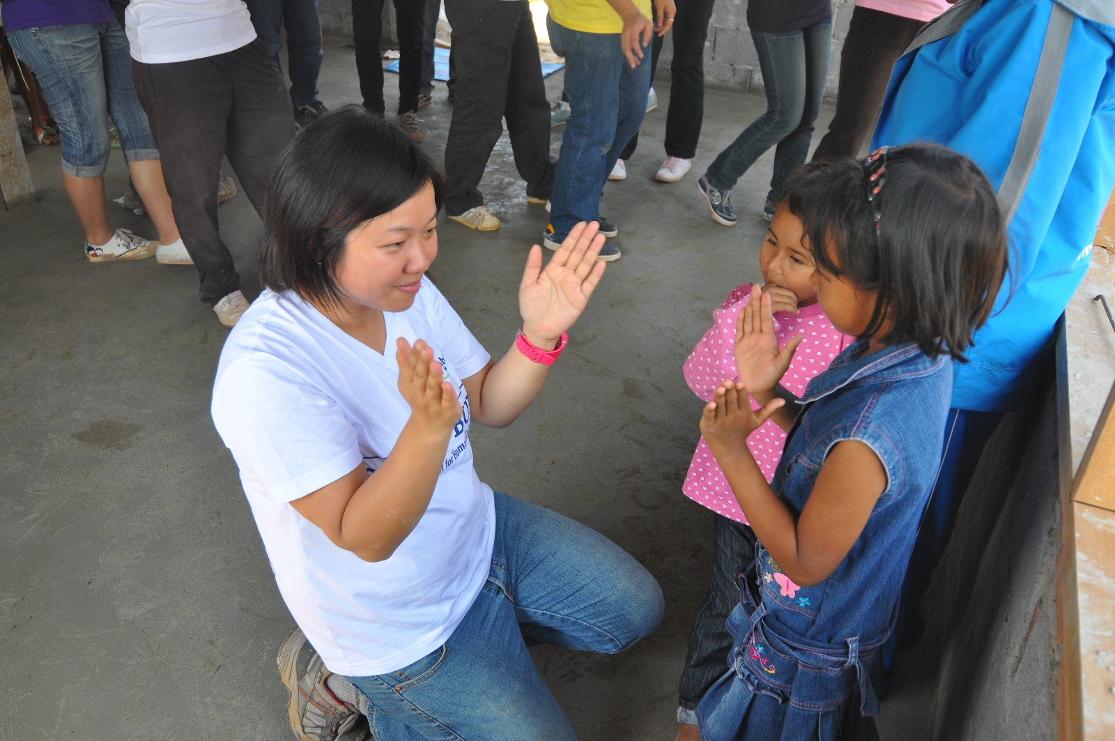 Volunteers interacting with local children