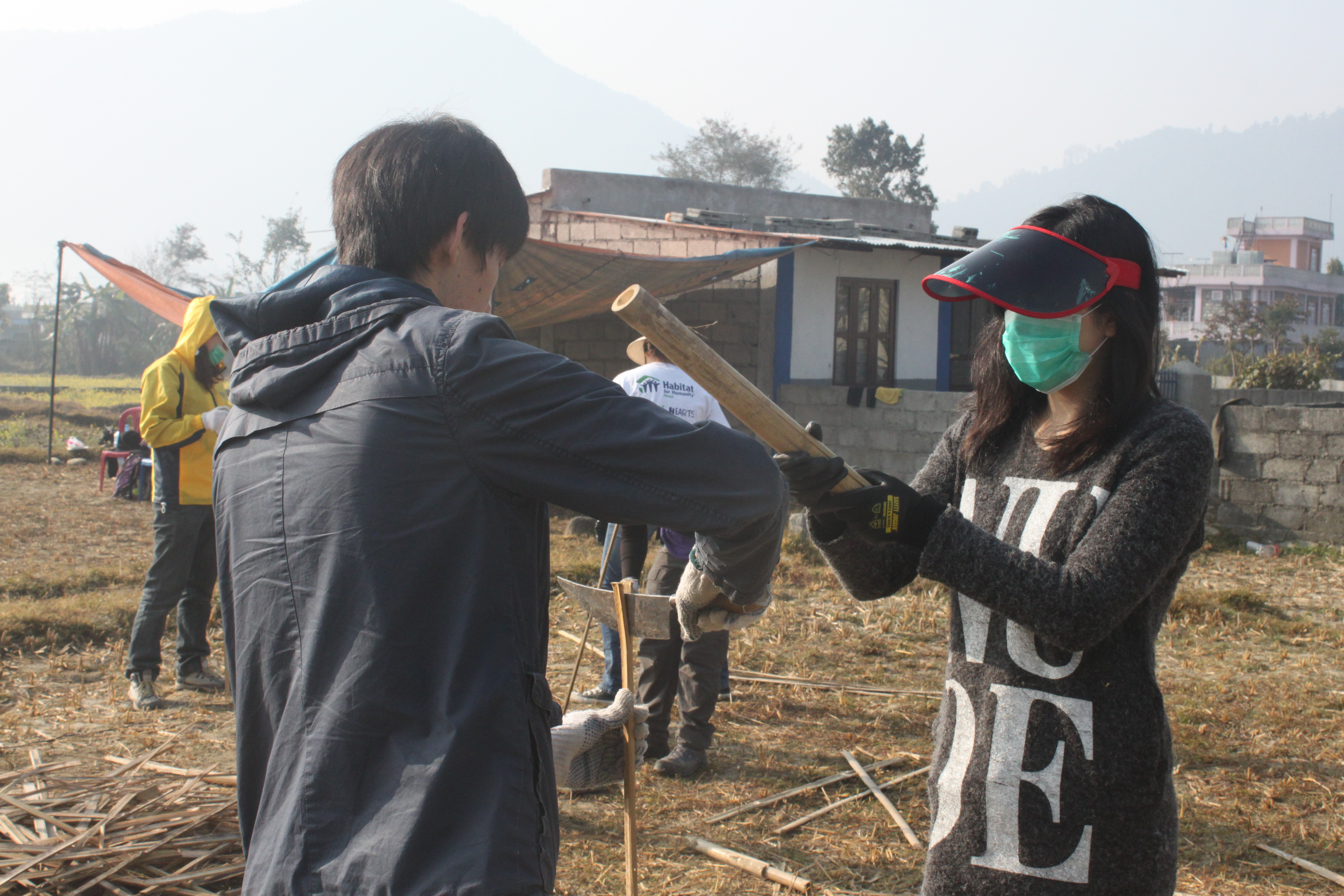 Cleaning up the bamboo for weaving