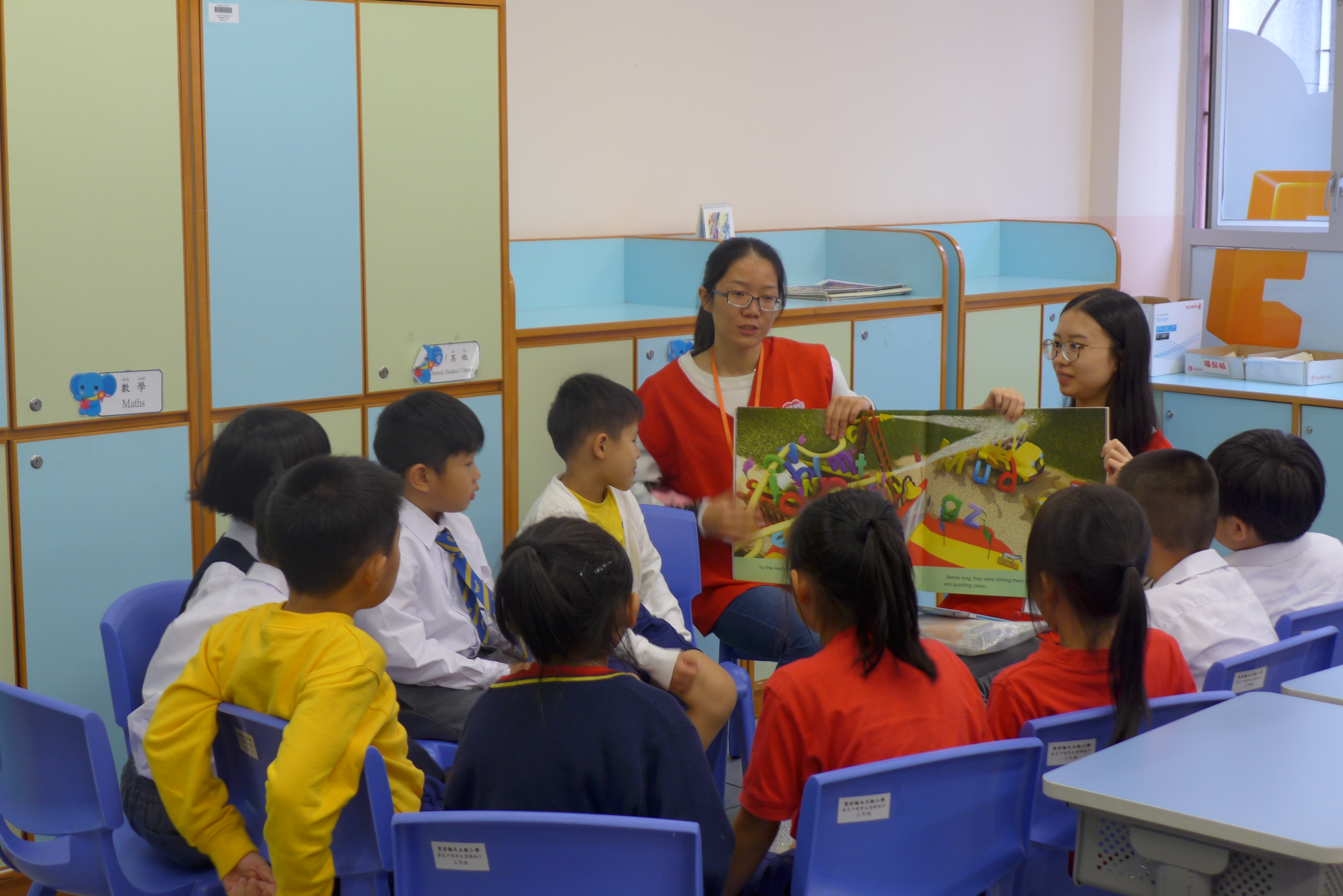 Volunteers having fun with the children