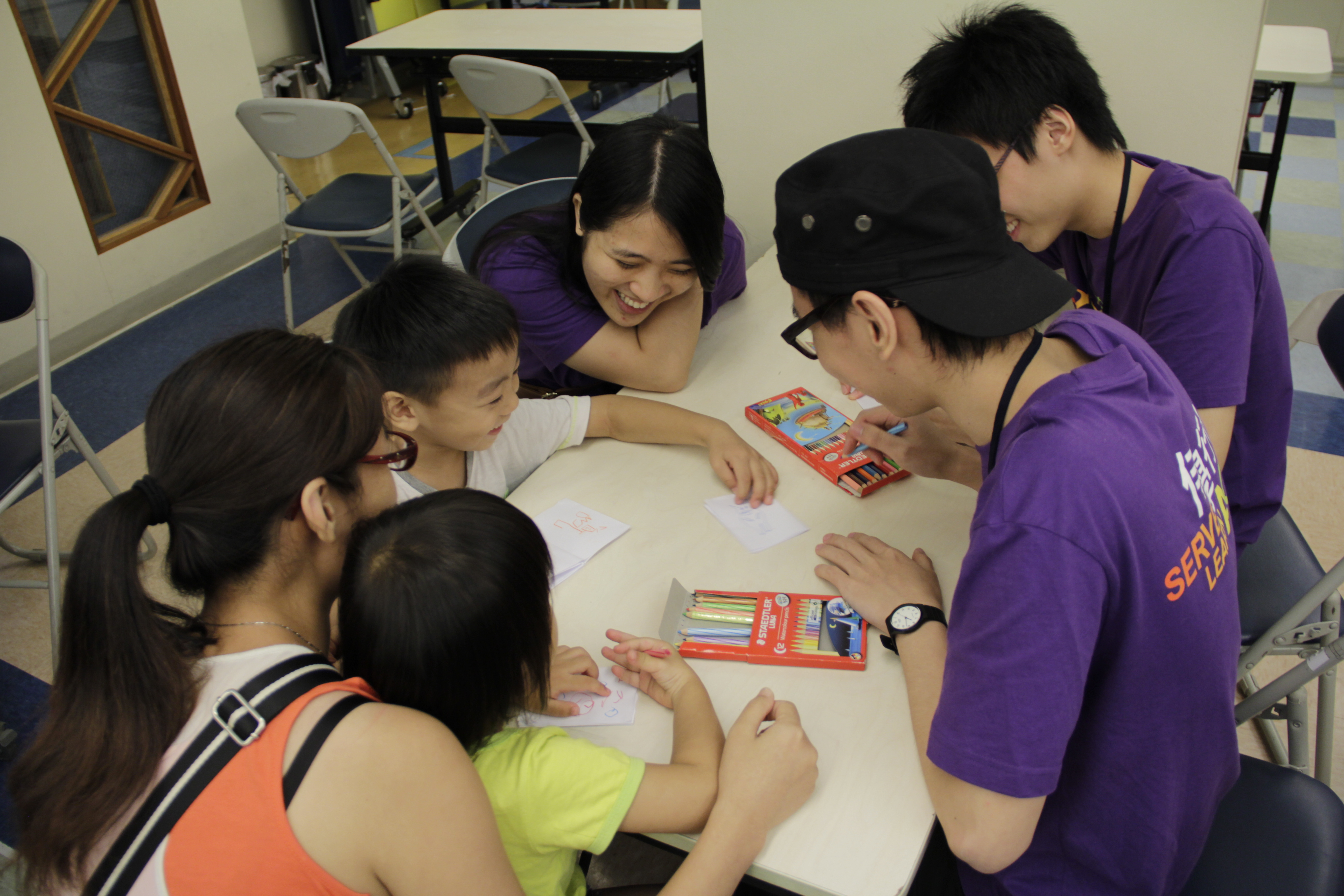 Children making a little booklet as a post-reading activity