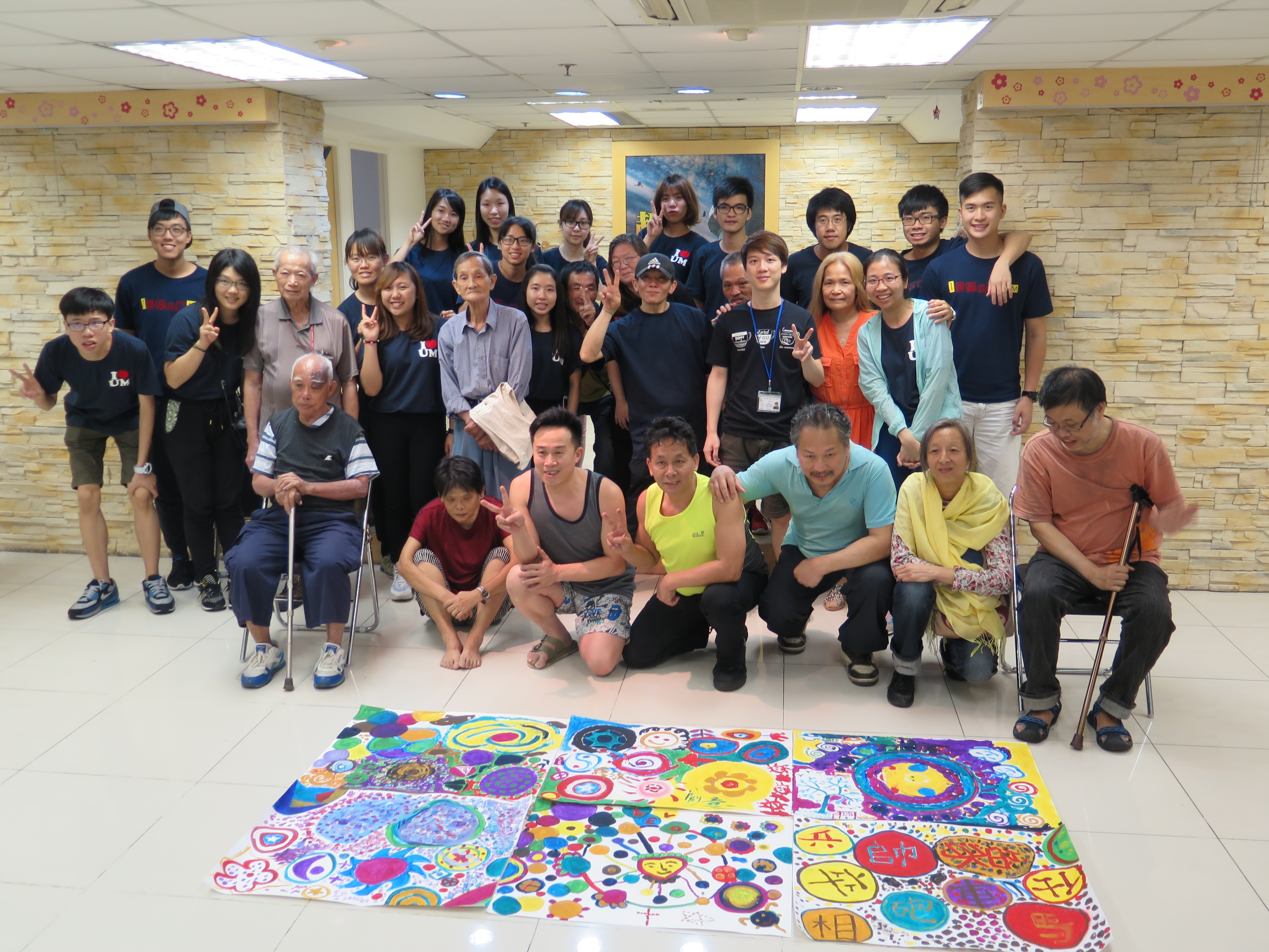 Finishing a circle painting with the homeless in Sham Shui Po