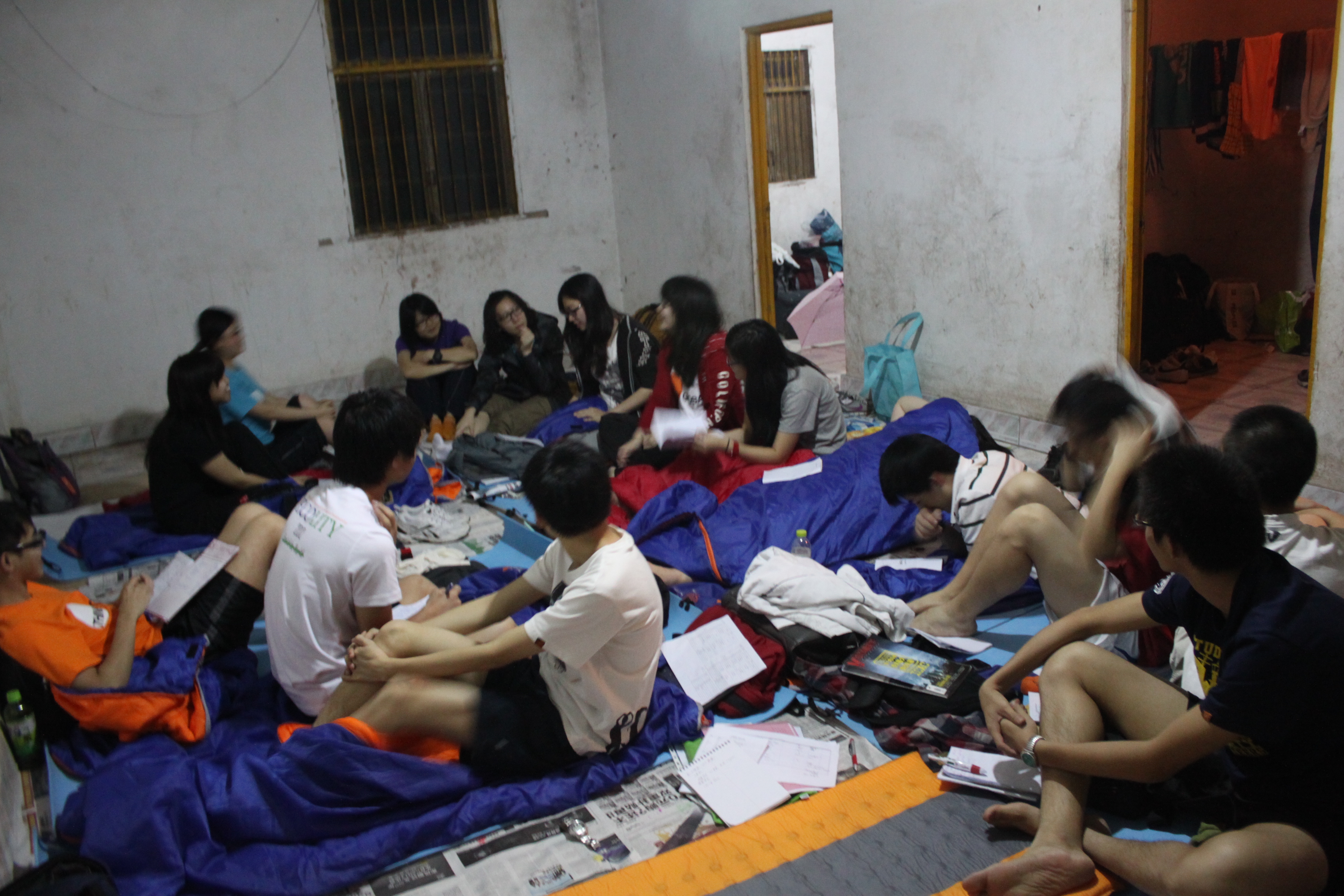 Volunteers having a debriefing at night