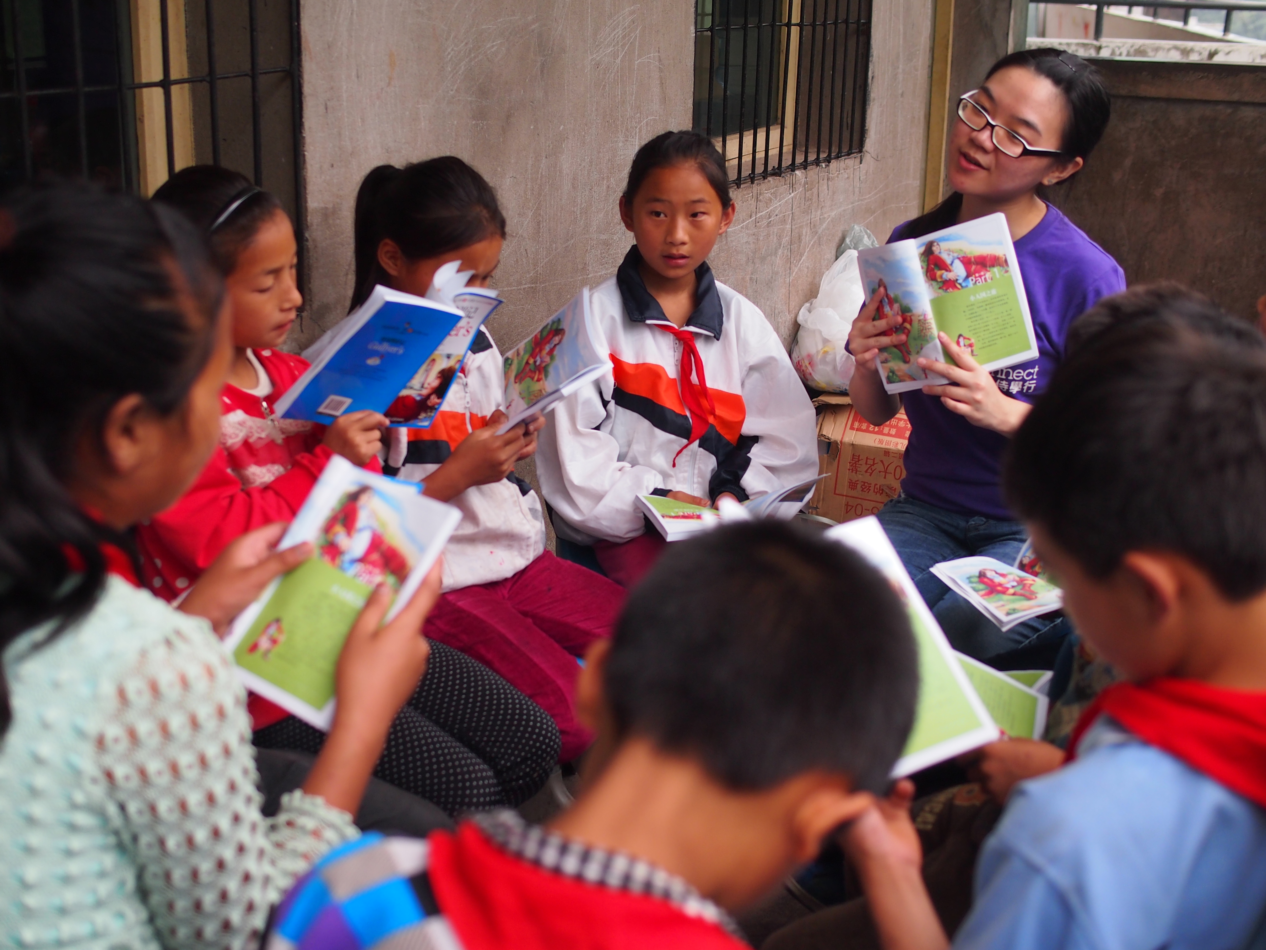 They enjoying reading story booking