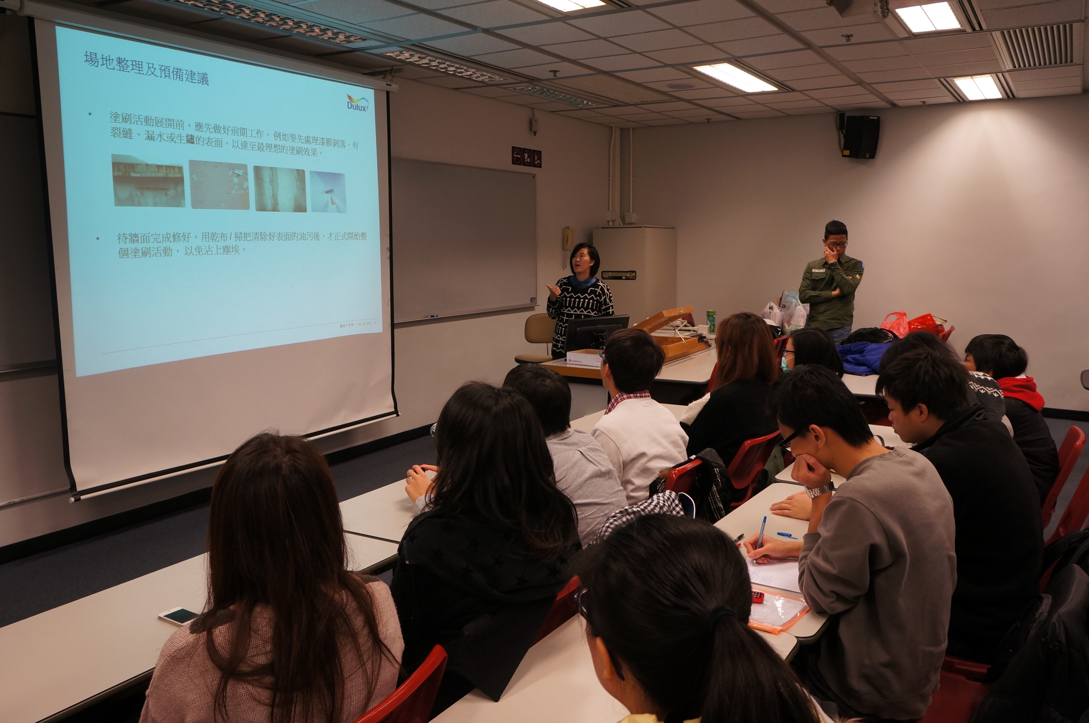 Staff from Dulux conducting a training workshop for our volunteers