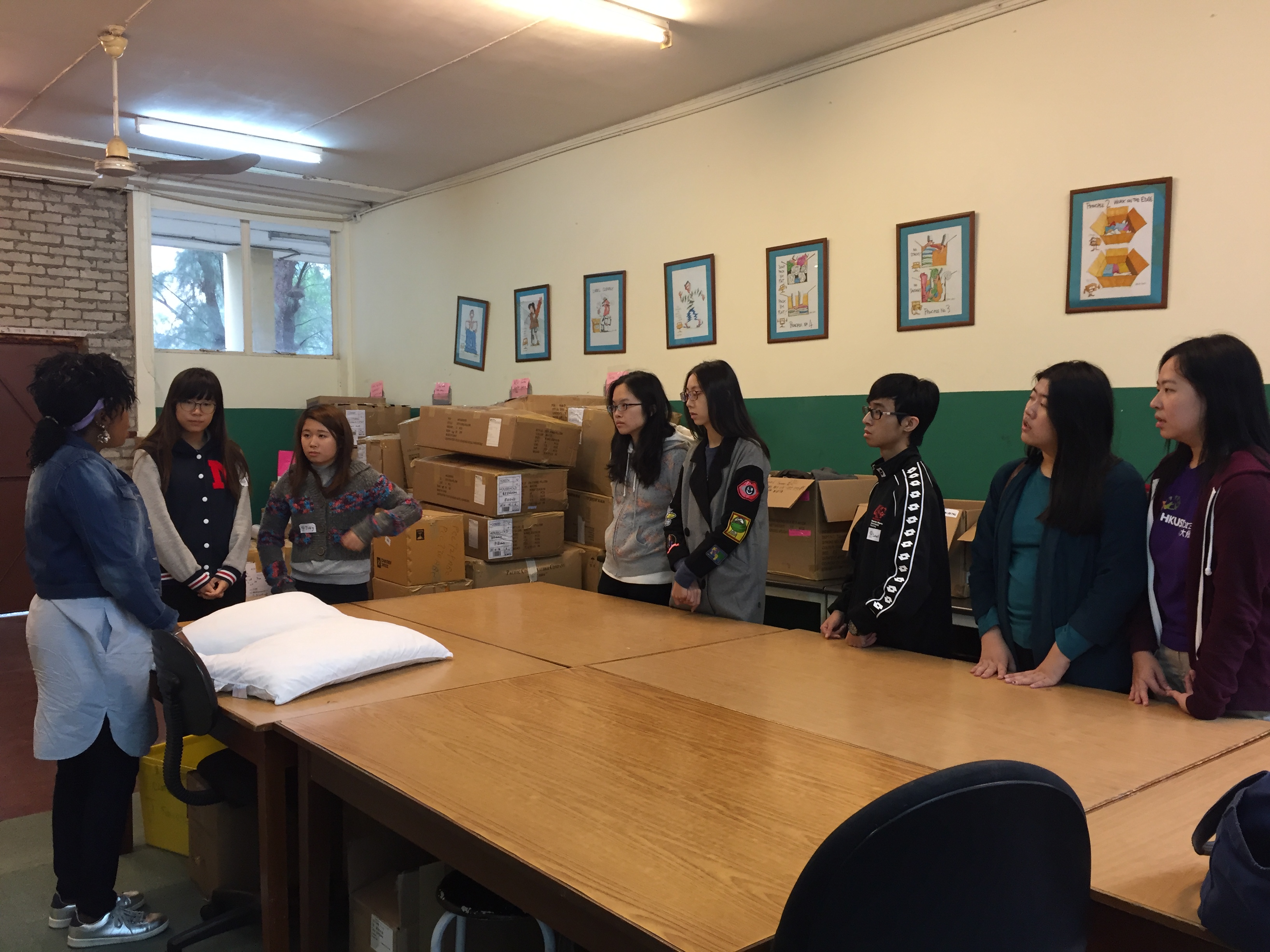 Volunteers listening to instructions