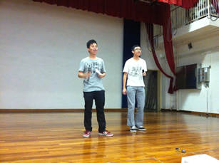 Student volunteers leading games for the elders