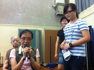 The elder actively participating in the activity	