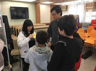 Children playing the game to gain ingredients for making yogurt cup!