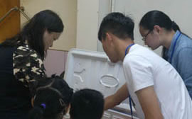 Volunteers helping in disturbuting the meal boxes