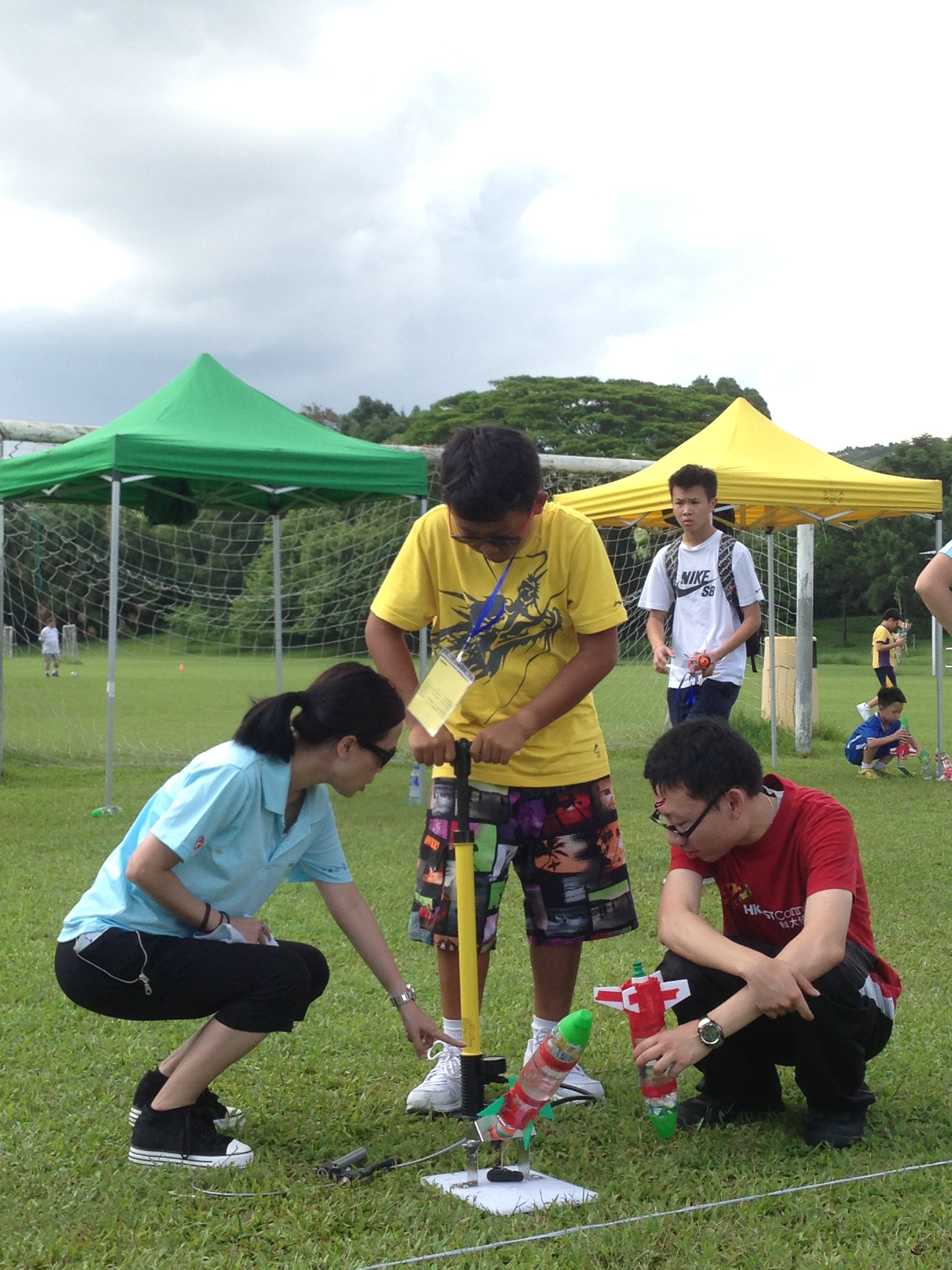 Volunteers ensuring the safety of the water rocket