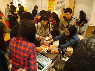 Volunteers distributing dinner to the families