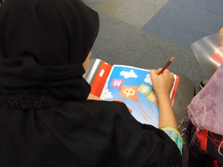 Children filling out the worksheet