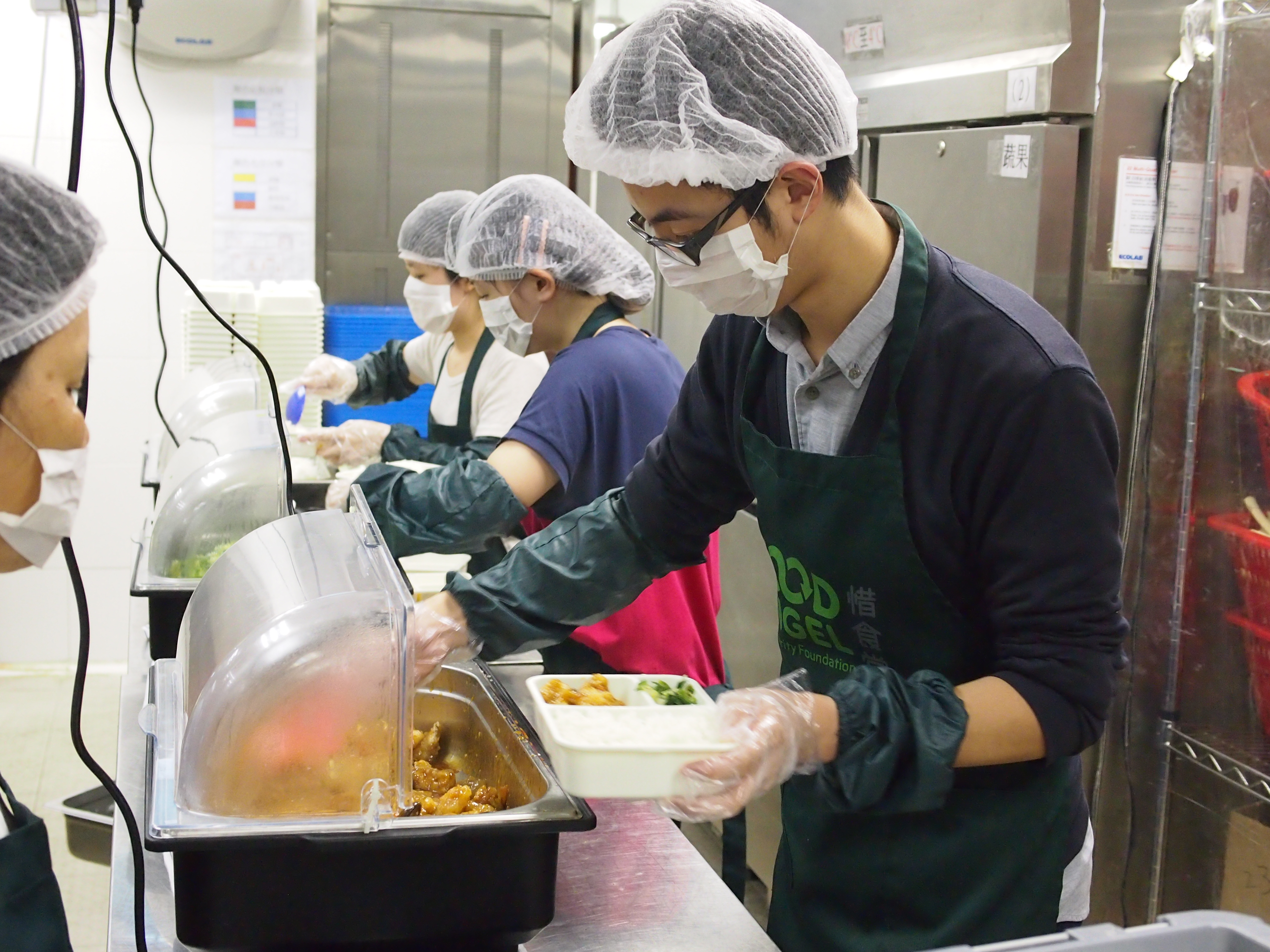 Packing the hot meal boxes