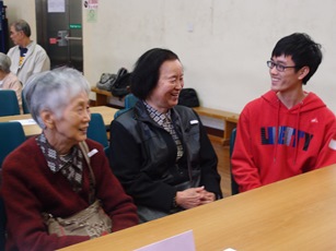Student volunteers enjoying a chat with the elders
