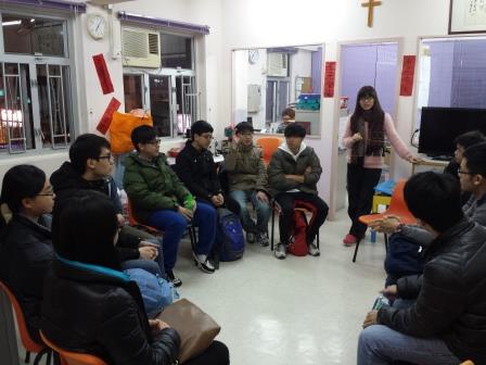 The social worker introducing the background of Shum Shui Po