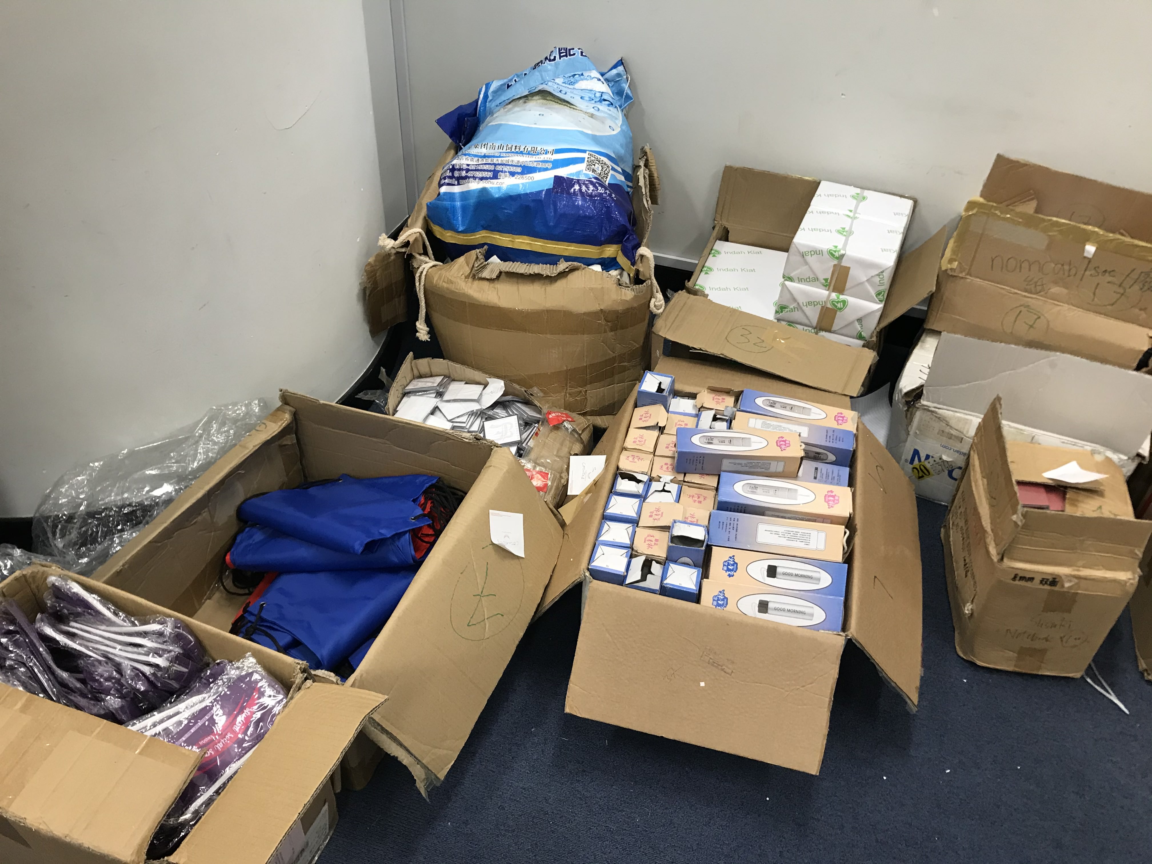 Stock-taking surplus souvenirs collected from O' Camp