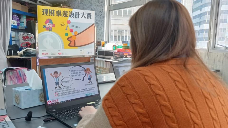 Student preparing the board game for children