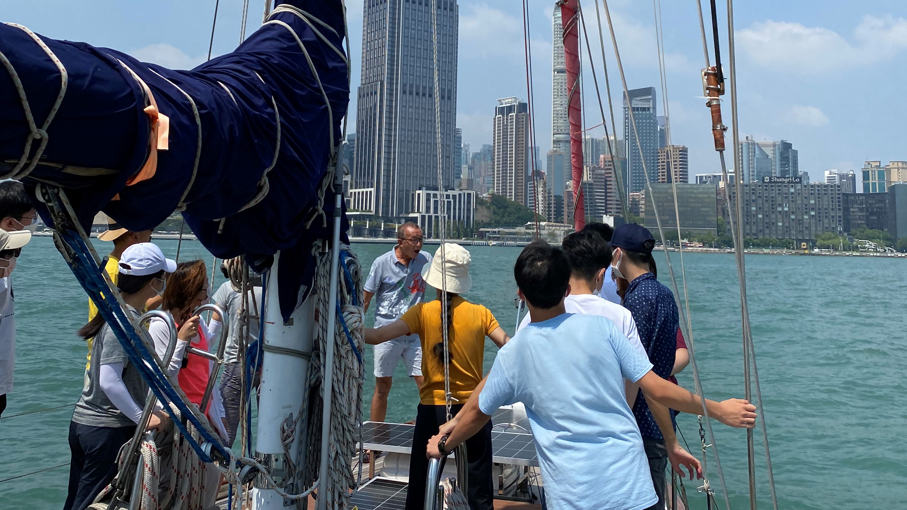 Participants conversing on the deck