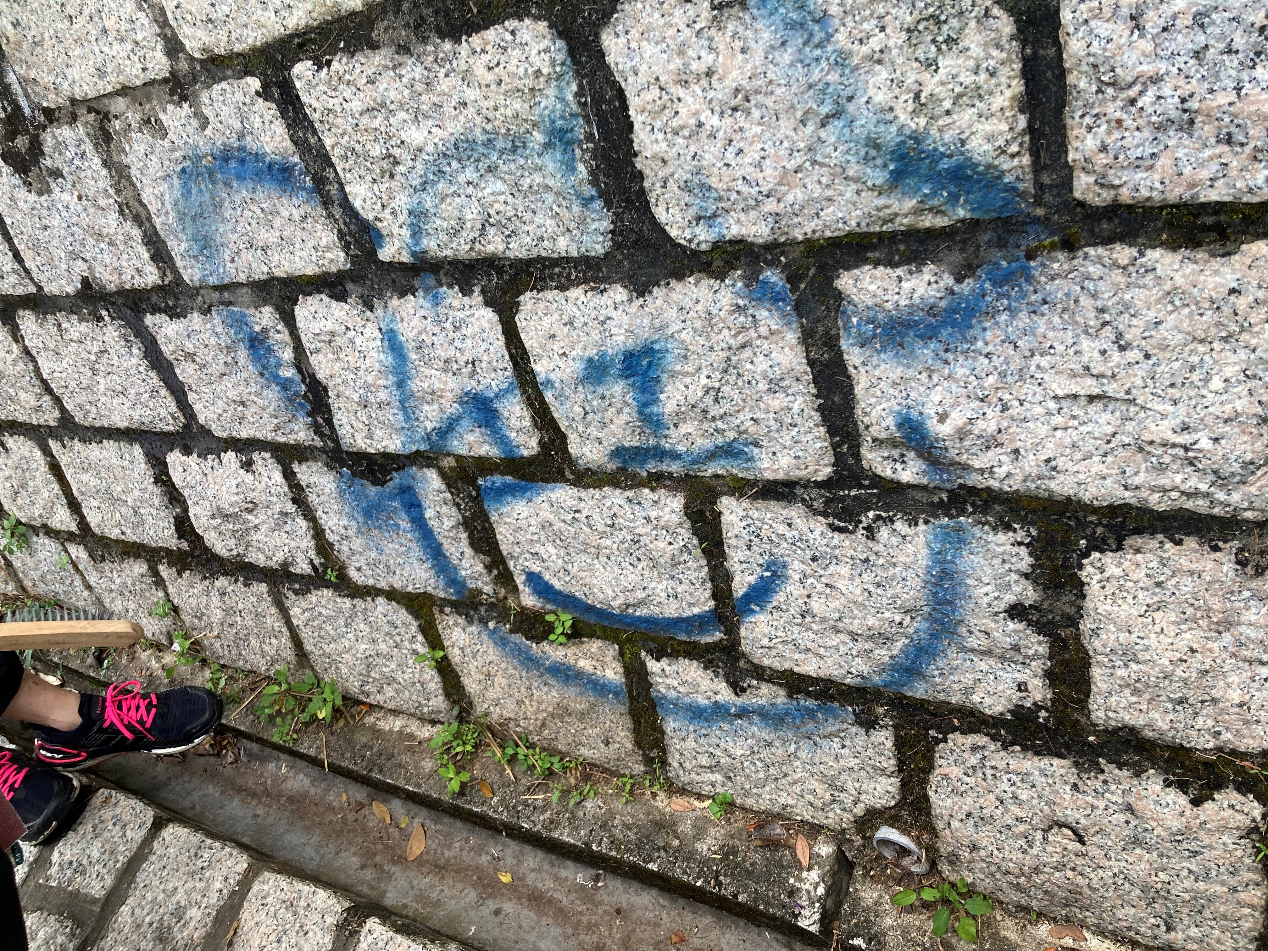 A 'before' picture of a graffiti on rocks