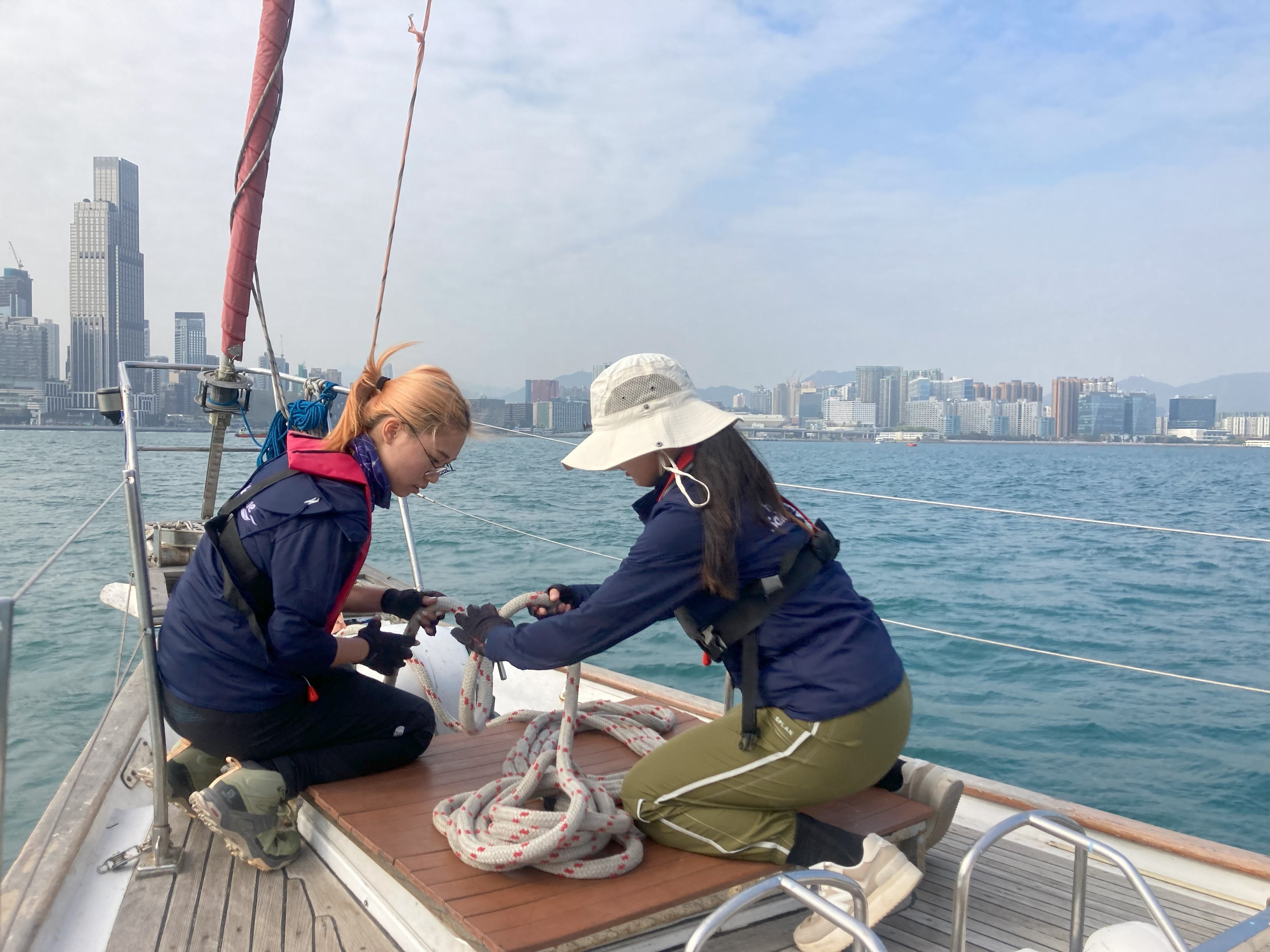 students serving on the yacht