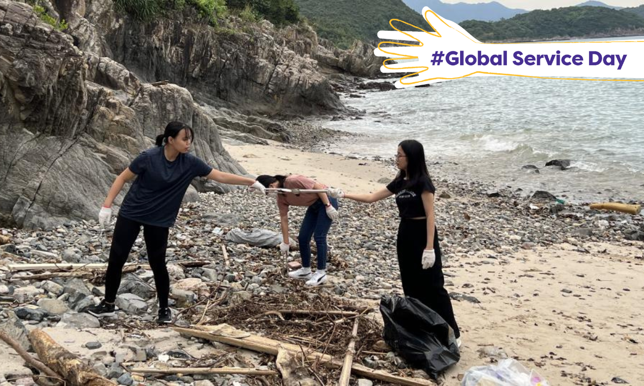 students cleaning the beach