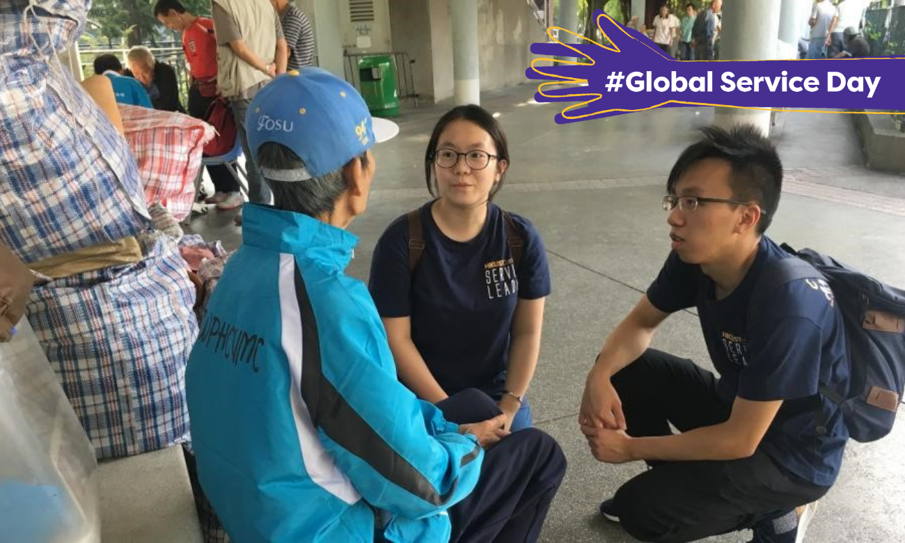 Volunteers talking to a street sleeper