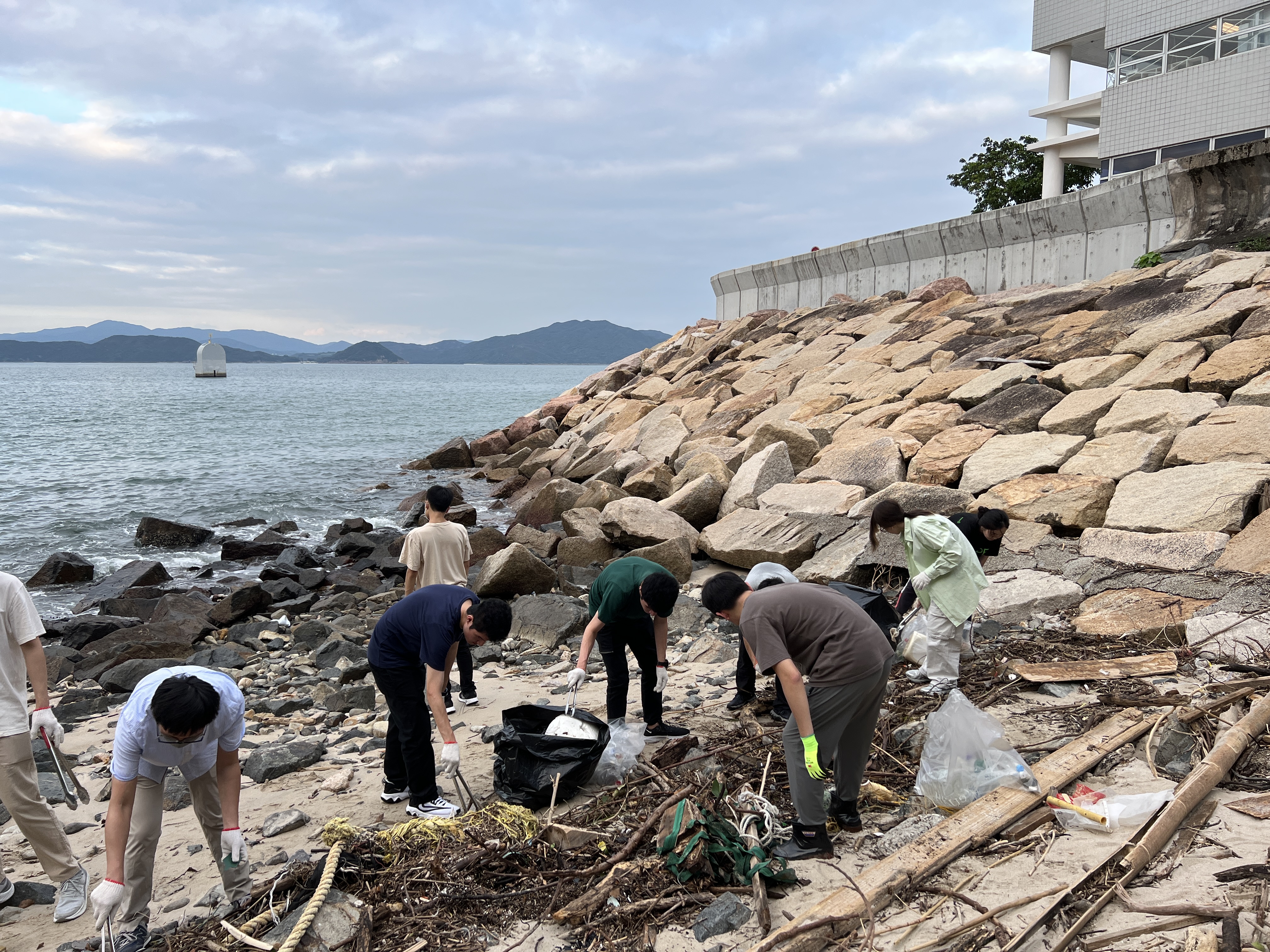 Volunteers picking up trash.