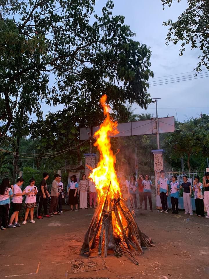 Having campfire with the local youth