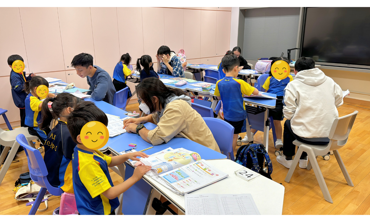 Volunteers assisting students with their homework